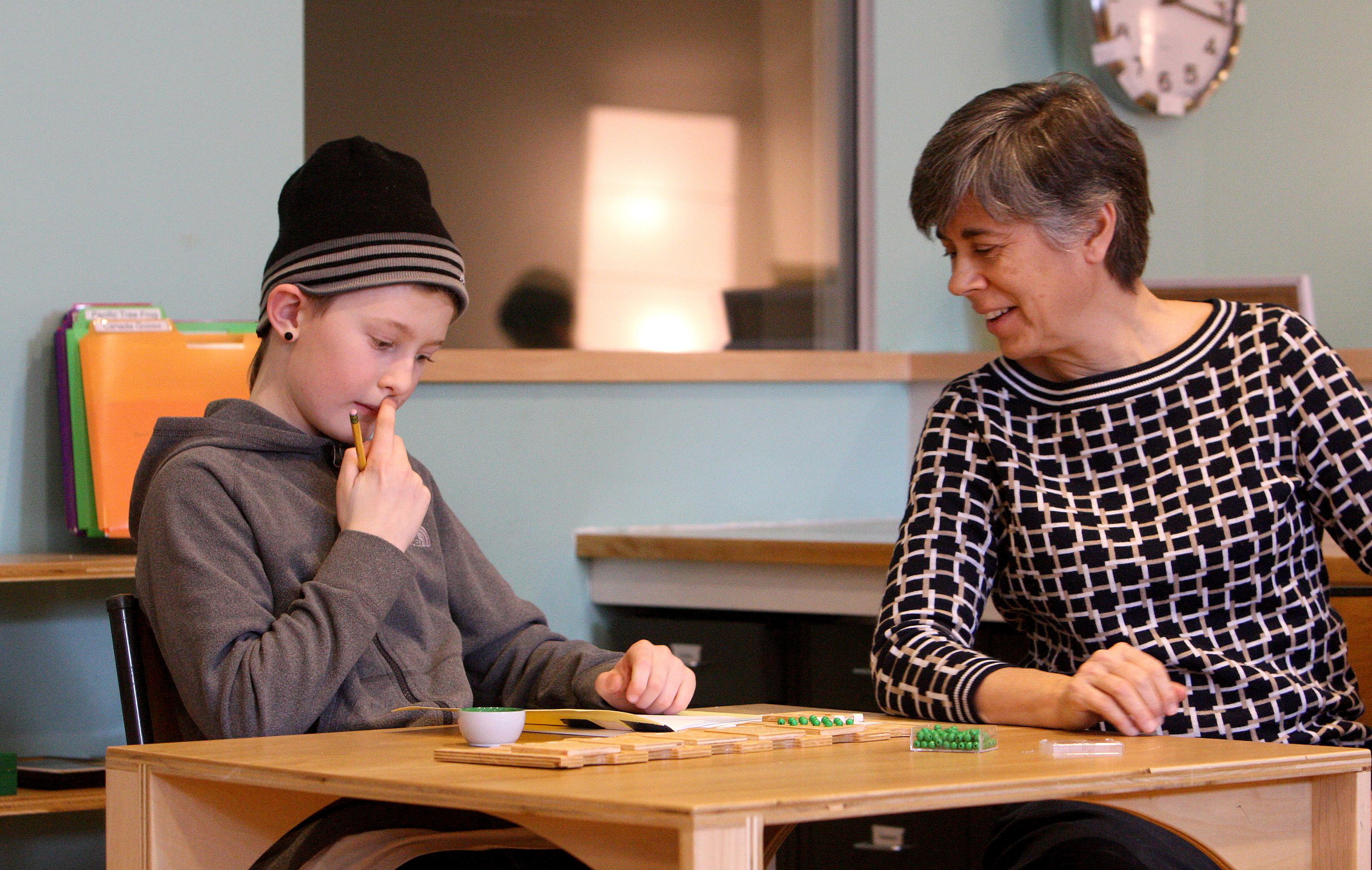 Kari Frentzel (right) worked with a student at Wild Rose.