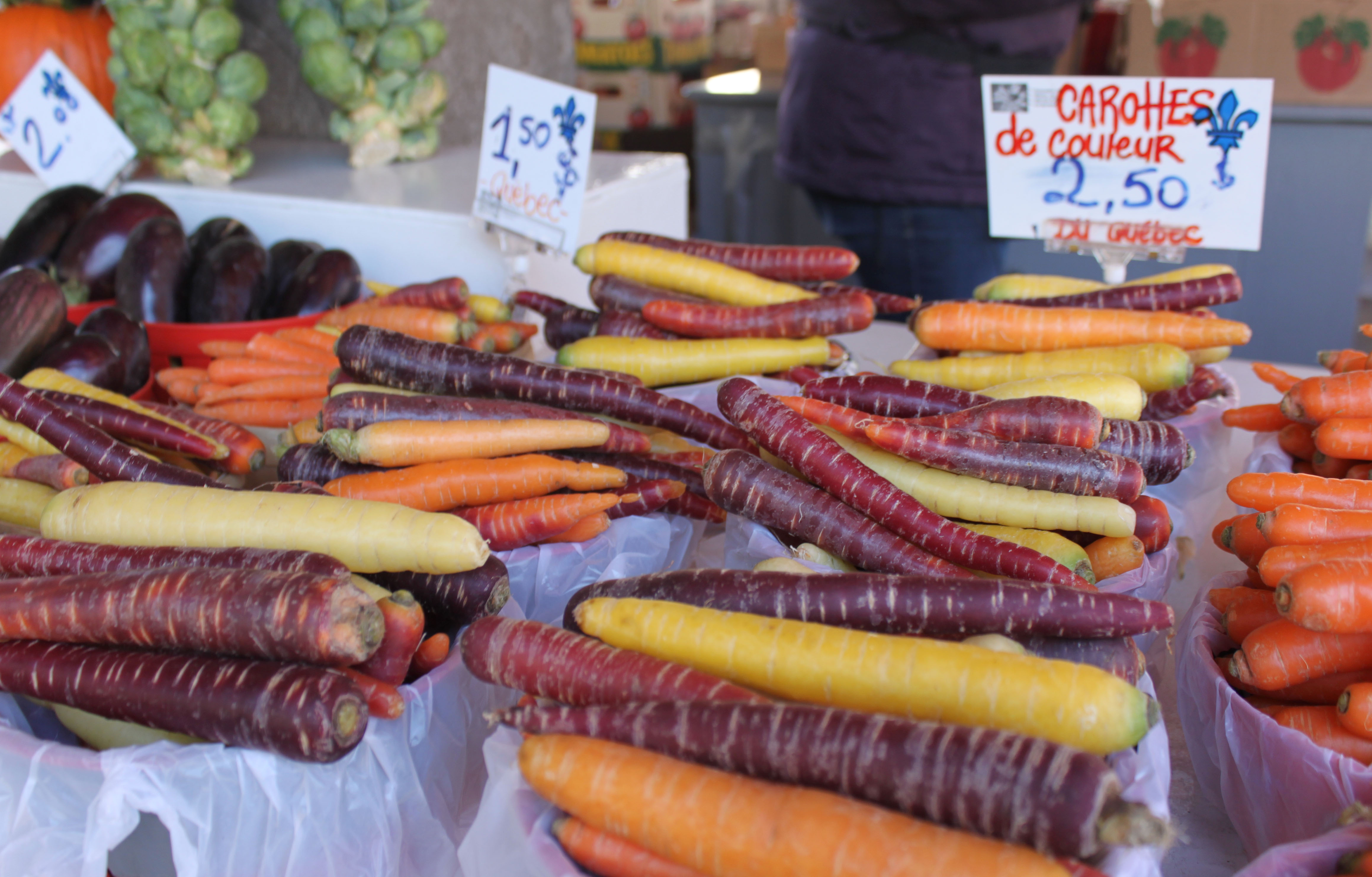 A vendor's colorful carrots are displayed for sale at Montreal’s Jean Talon Market.