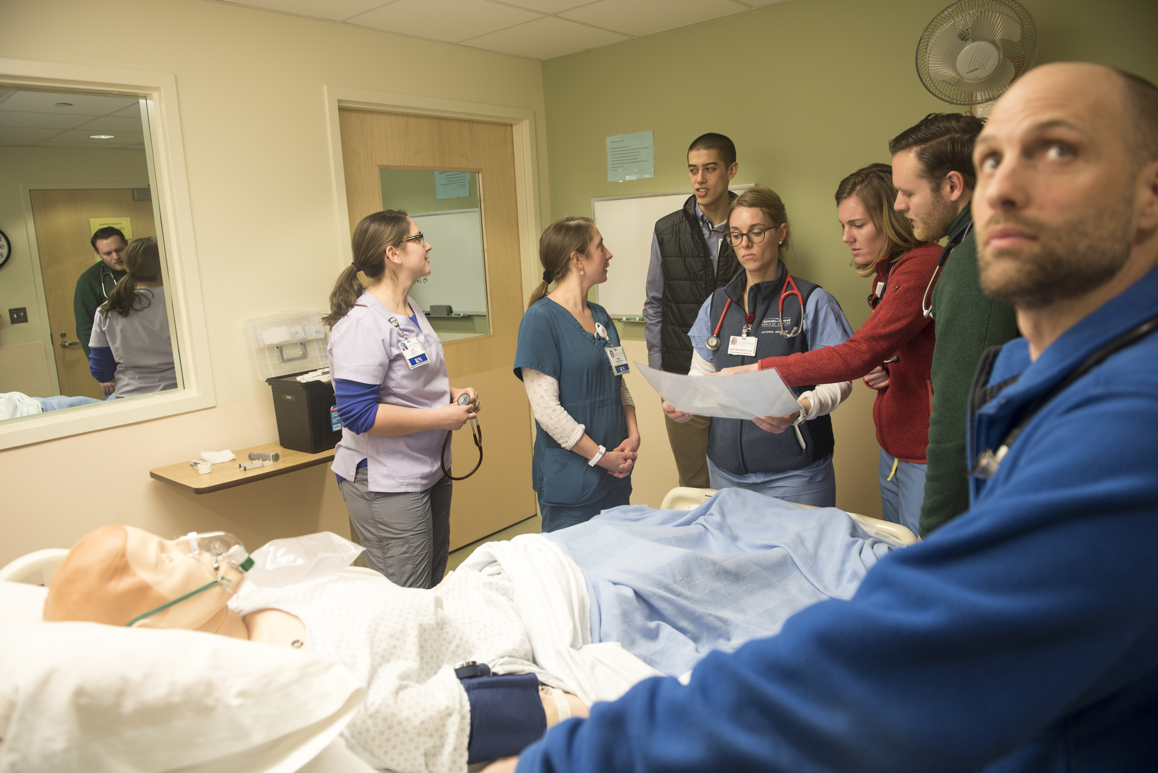 From Left, Jodi Hard, Tessa Lawrence, Jeff Endicott, Heather Wright, Julia Powelson, Matthew Shear, and Major Munson during a simulation laboratory exercise.