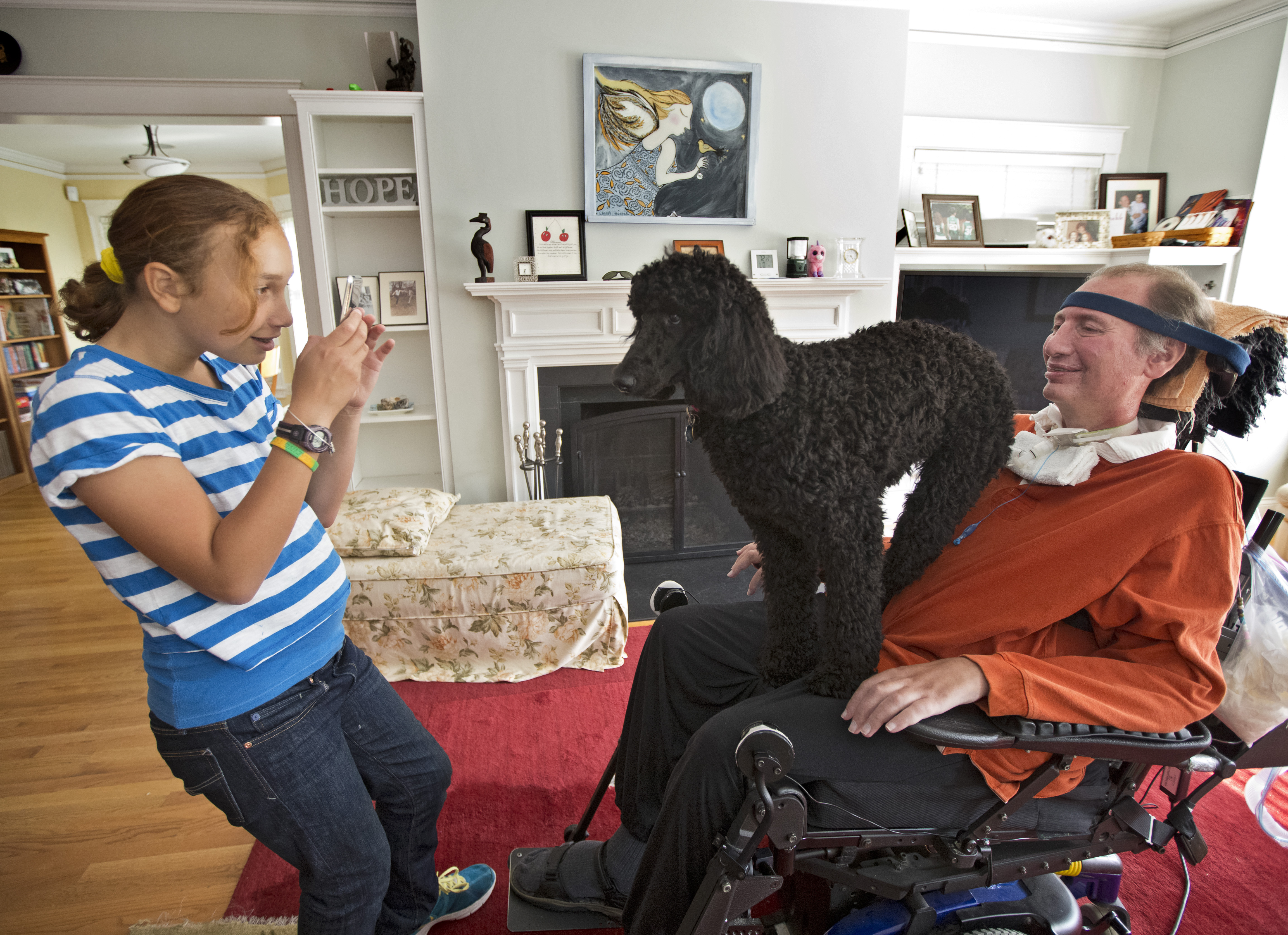 Elni Mazareas took a picture of her dad with their family dog, Bailey.