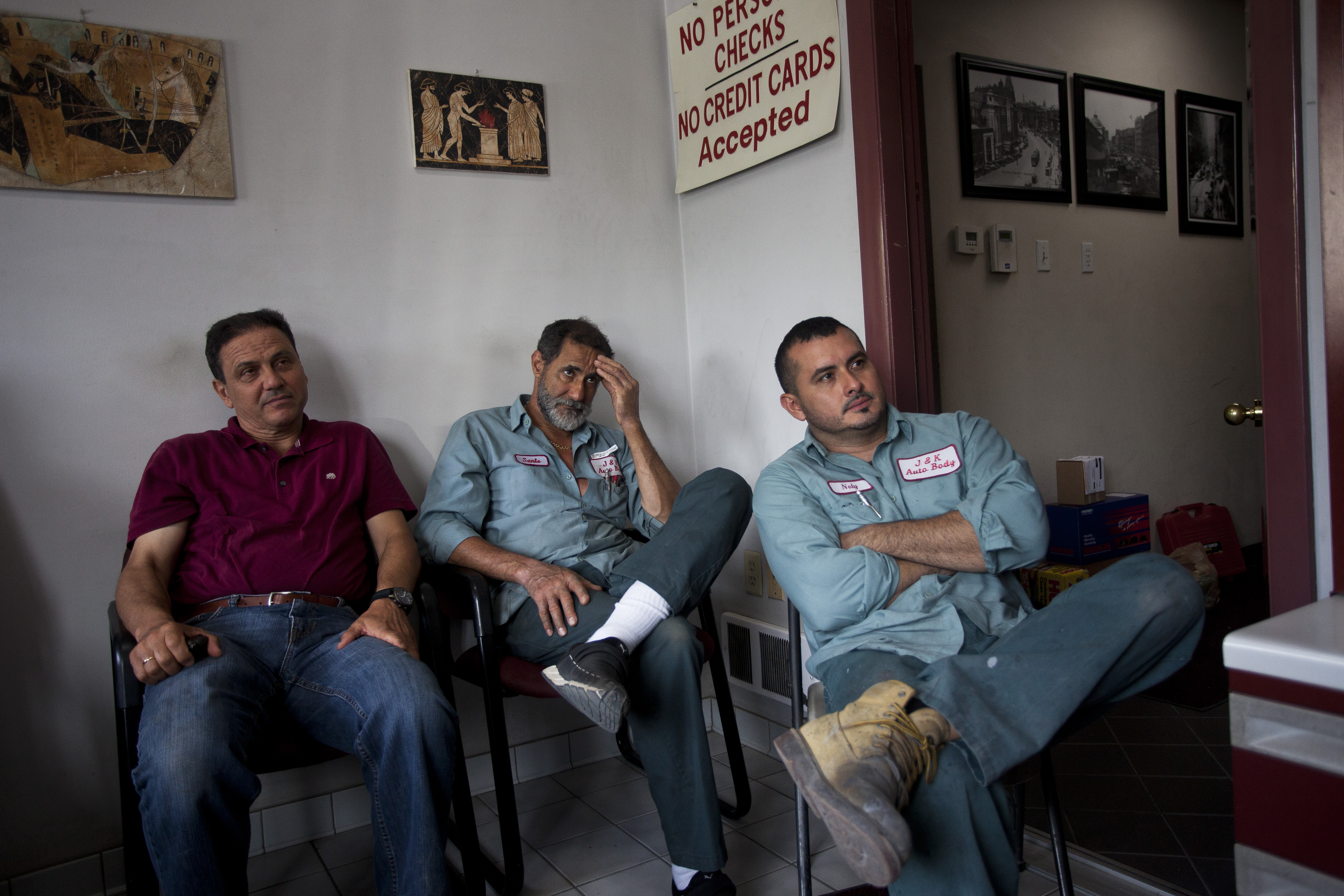 Inside J & K Auto Body in Brighton, any World Cup game is more than enough reason to take a break from work, thanks to soccer-loving owner John Sarianides.