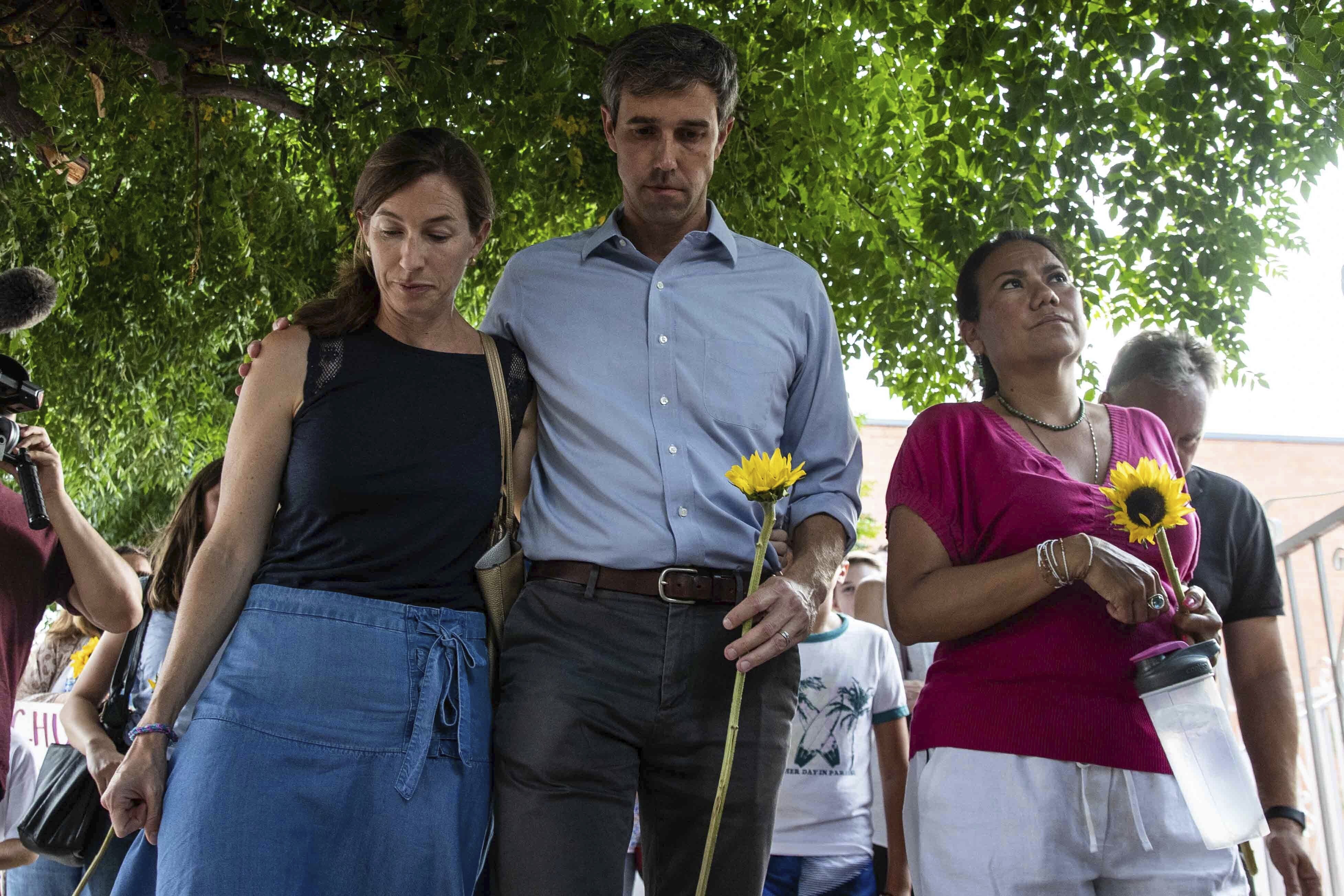 Former US Representative Beto O'Rourke (center) and US Representative Veronica Escobar (right) participated in a silent march in honor of the victims last week.