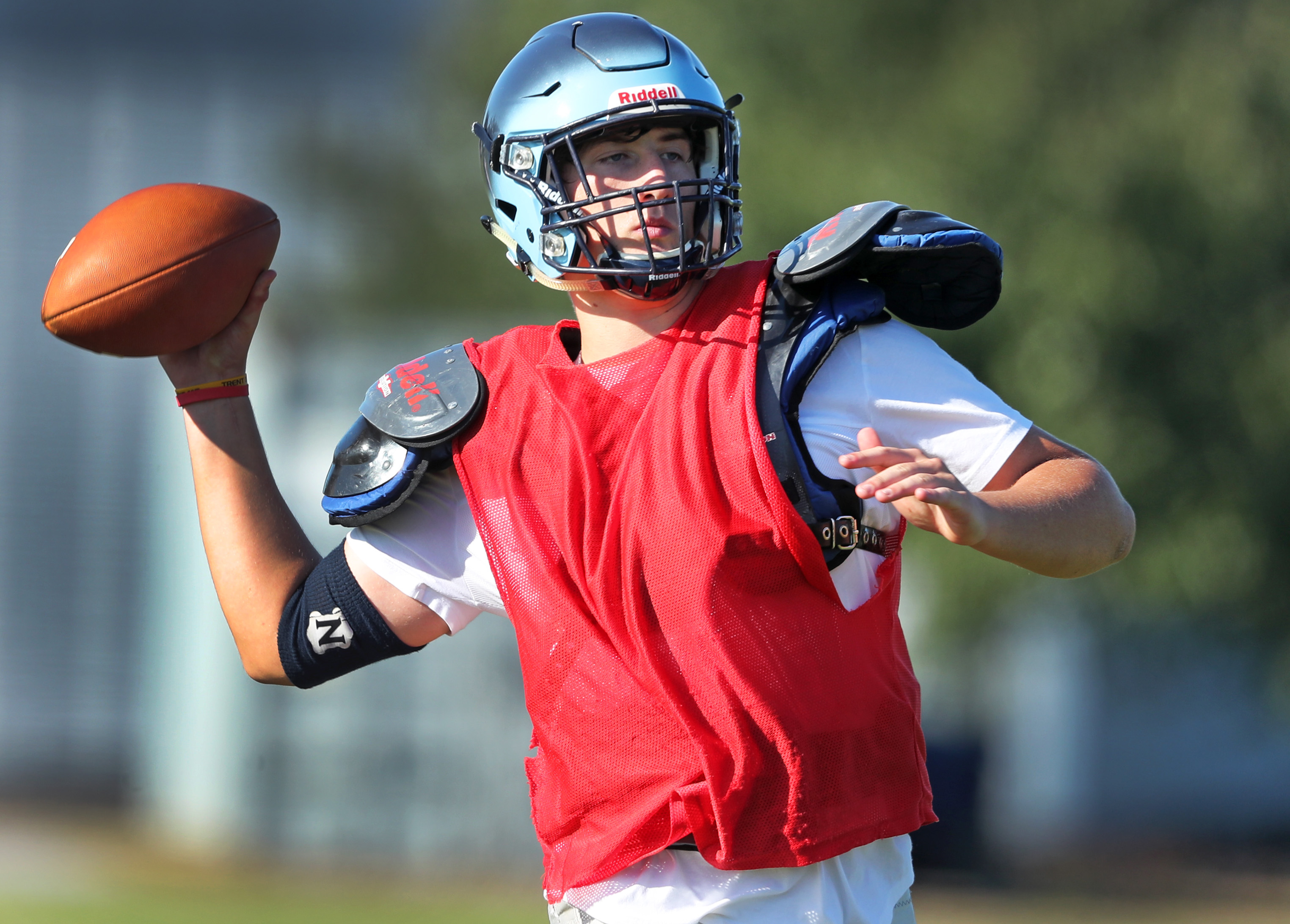 Phillips Andover QB Michael Thompson prepares to guide his team this season under the supervision of first-year coach Trey Brown.