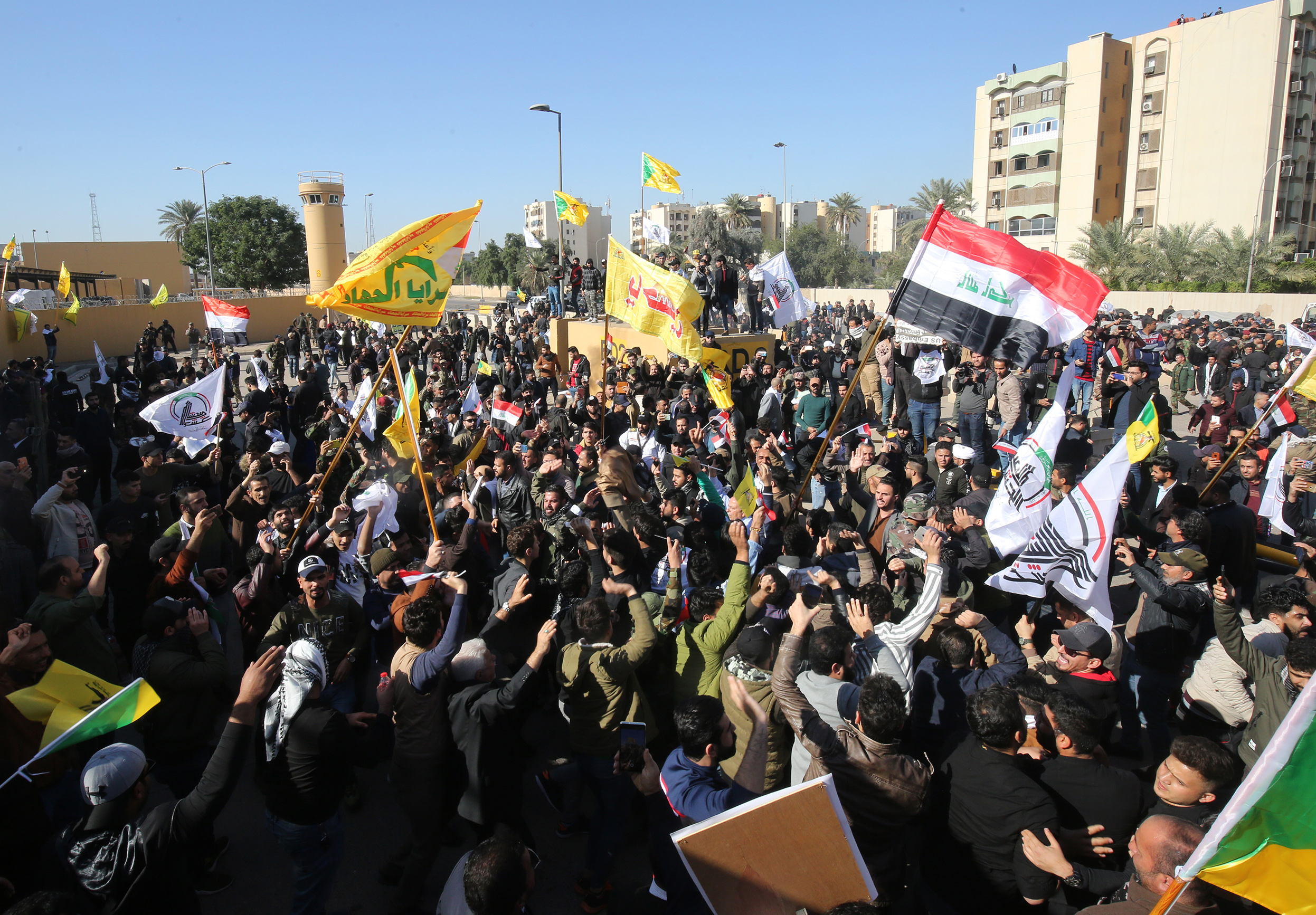 Several thousand Iraqi protesters waved national flags and banners of the Hashed al-Shaabi outside the US embassy in Baghdad.