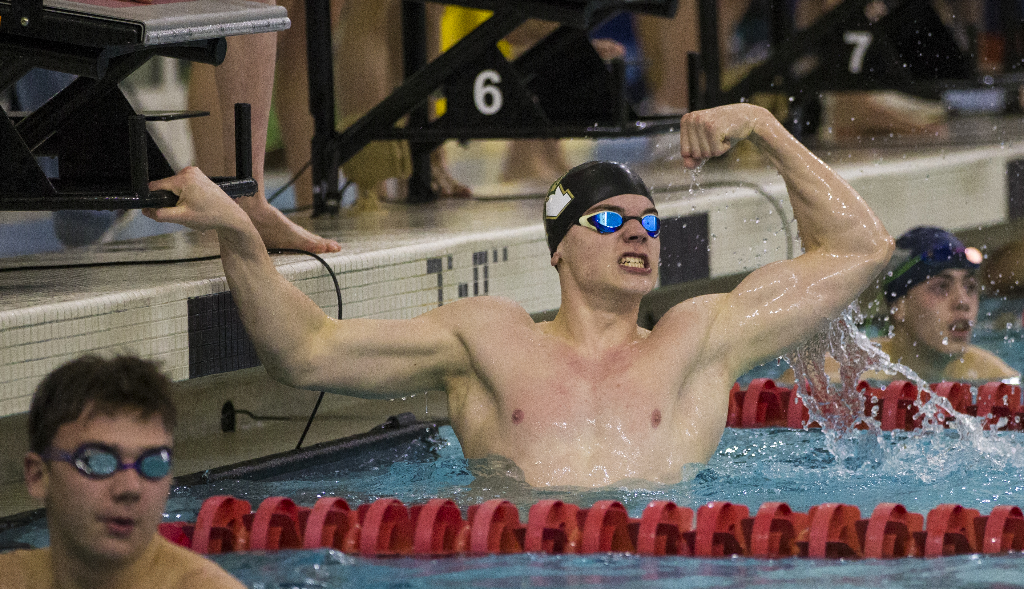 Cameron Watelet of Tyngsboro/Groton Dunstable flexed his might in winning the 100 butterfly.