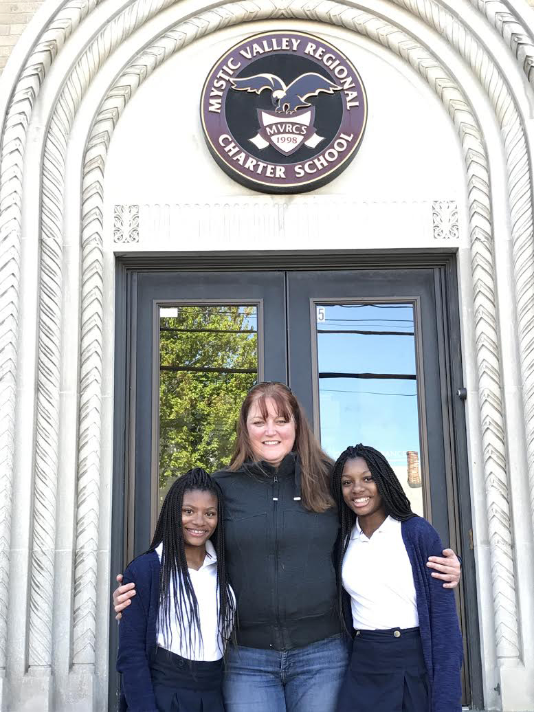 Deanna Cook, 15, mother Colleen Cook, Mya Cook, 15.