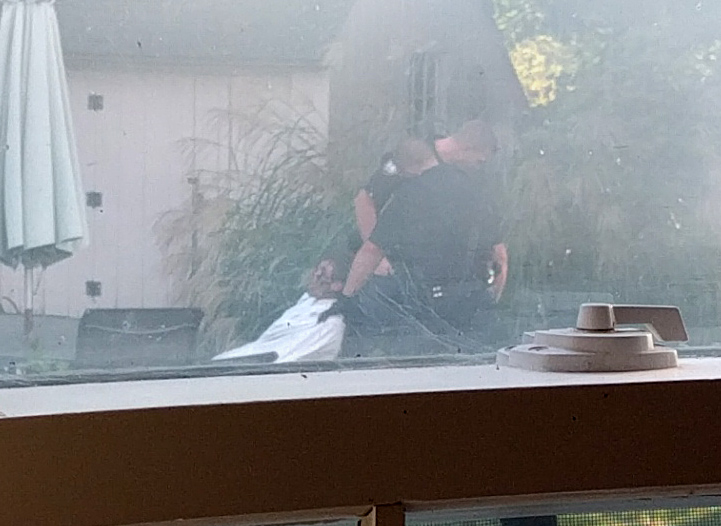 Police took the suspect into custody.