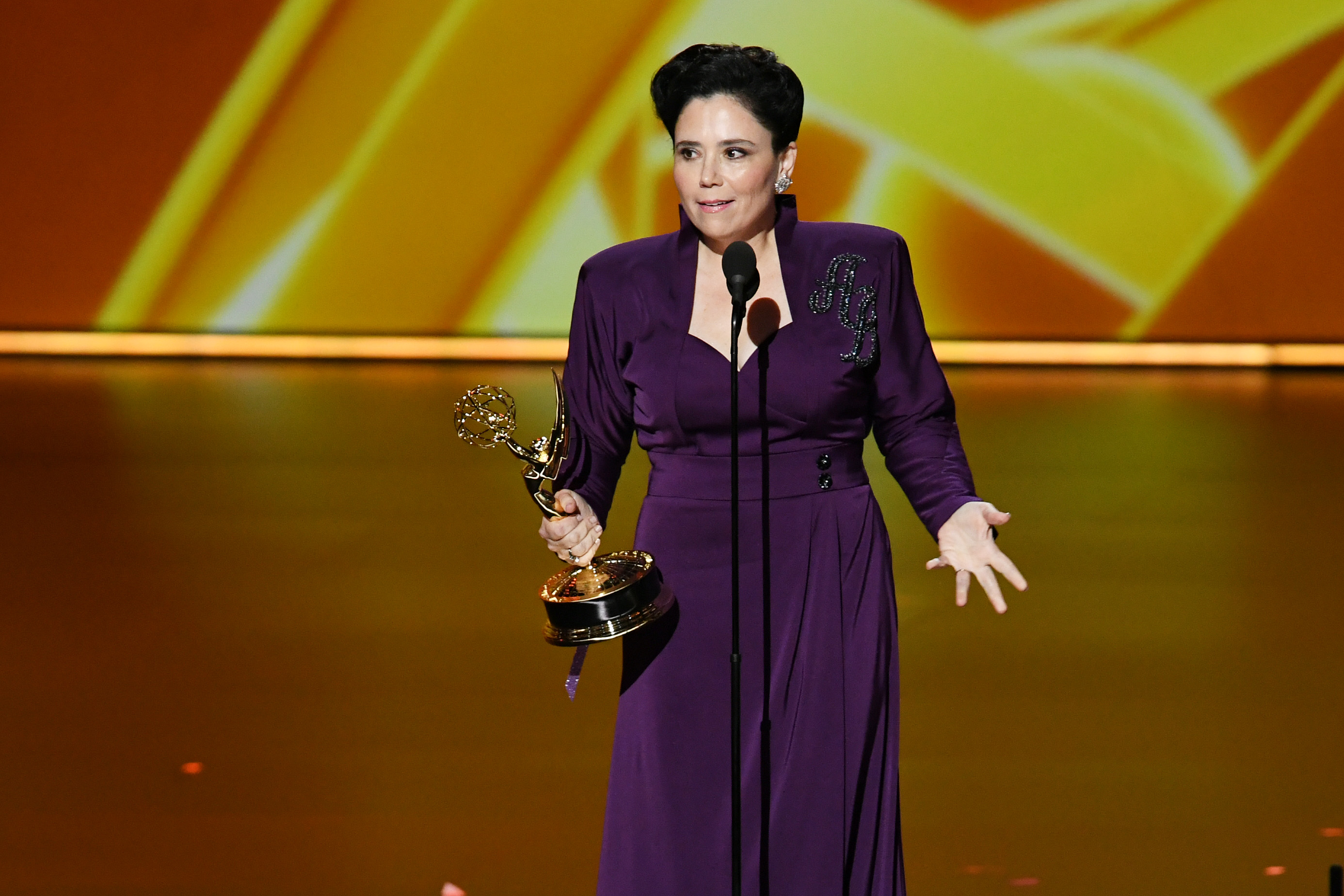 Alex Borstein accepted her Emmy on stage Sunday.