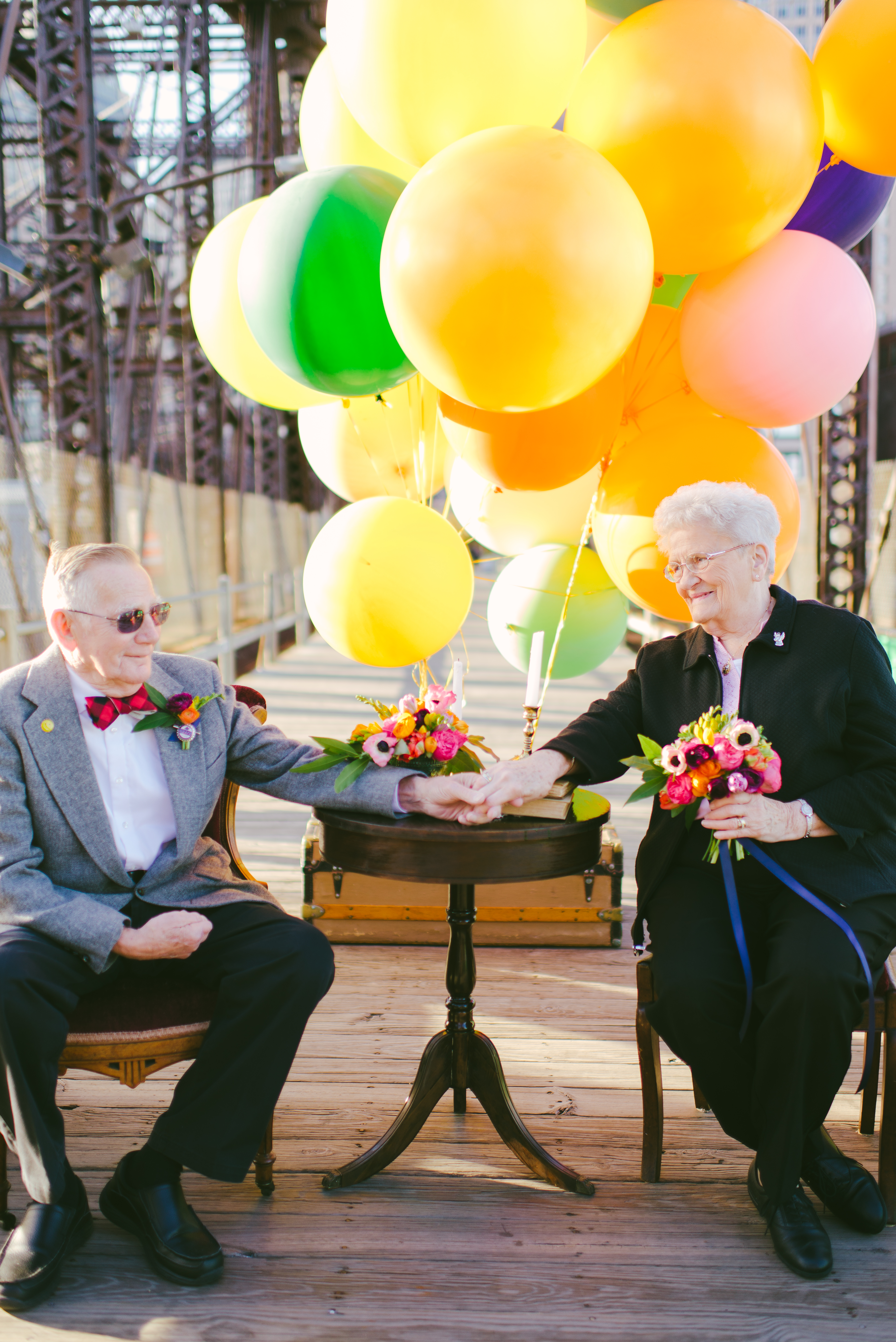 Dorothy and Donald Lutz during their “wedding” photo shoot — with a theme inspired by the Pixar movie “Up” — on the Old Northern Avenue Bridge in Boston.