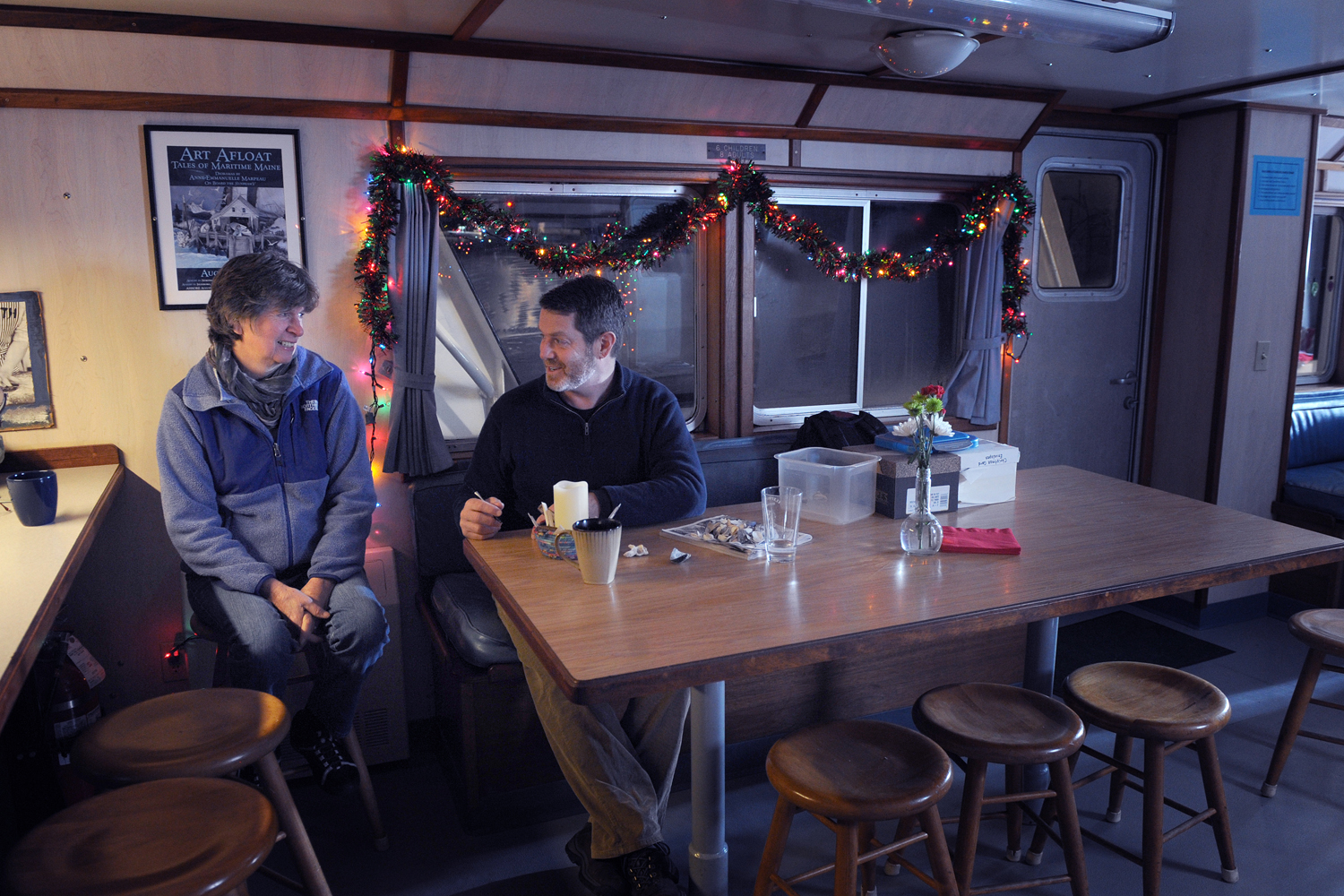 ,Nurse Sharon Daley and island outreach director Douglas Cornman below deck on the Sunbeam.