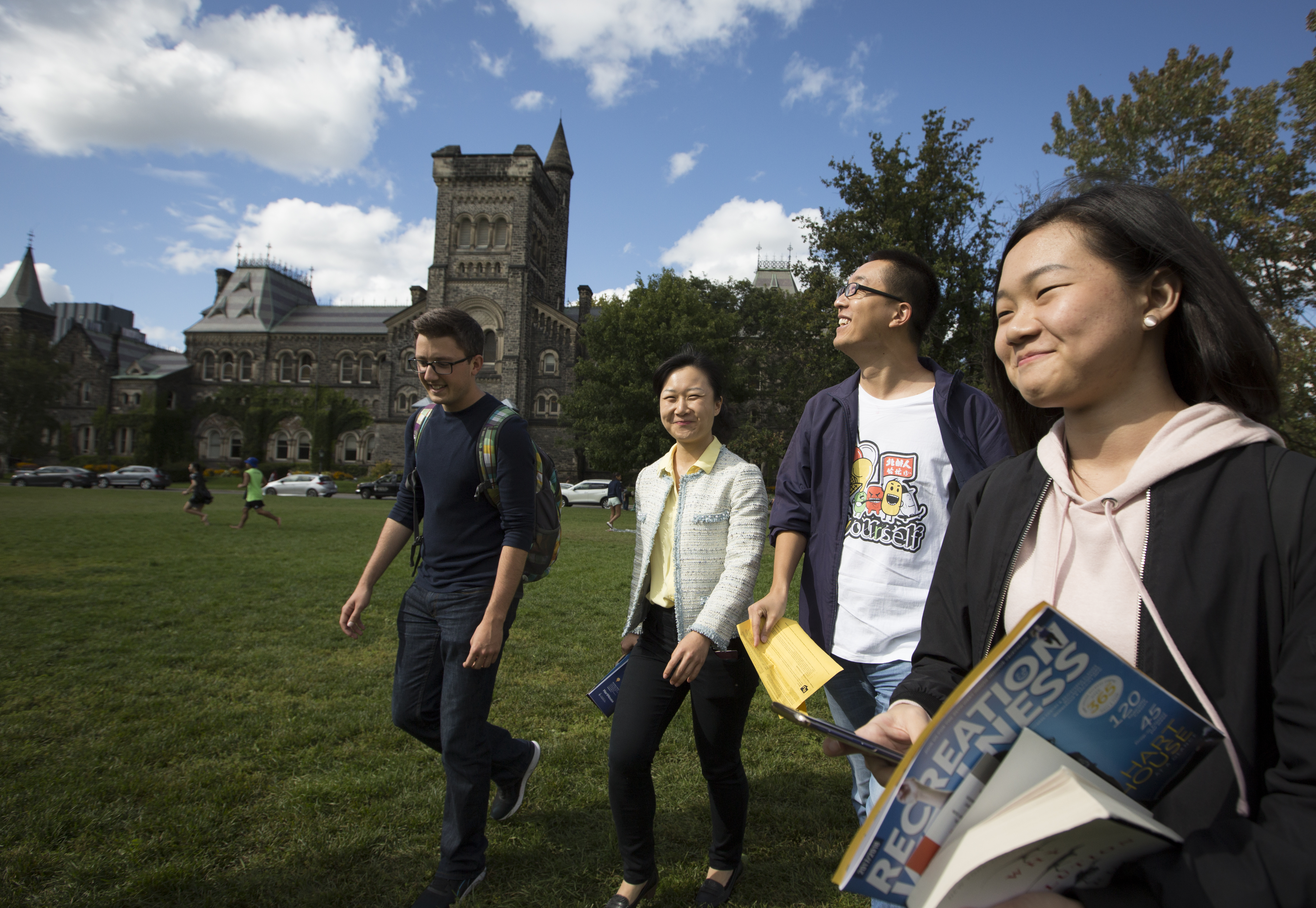 International students on a Canadian university campus, representing the demographic affected by new visa caps. (amazonaws.com)