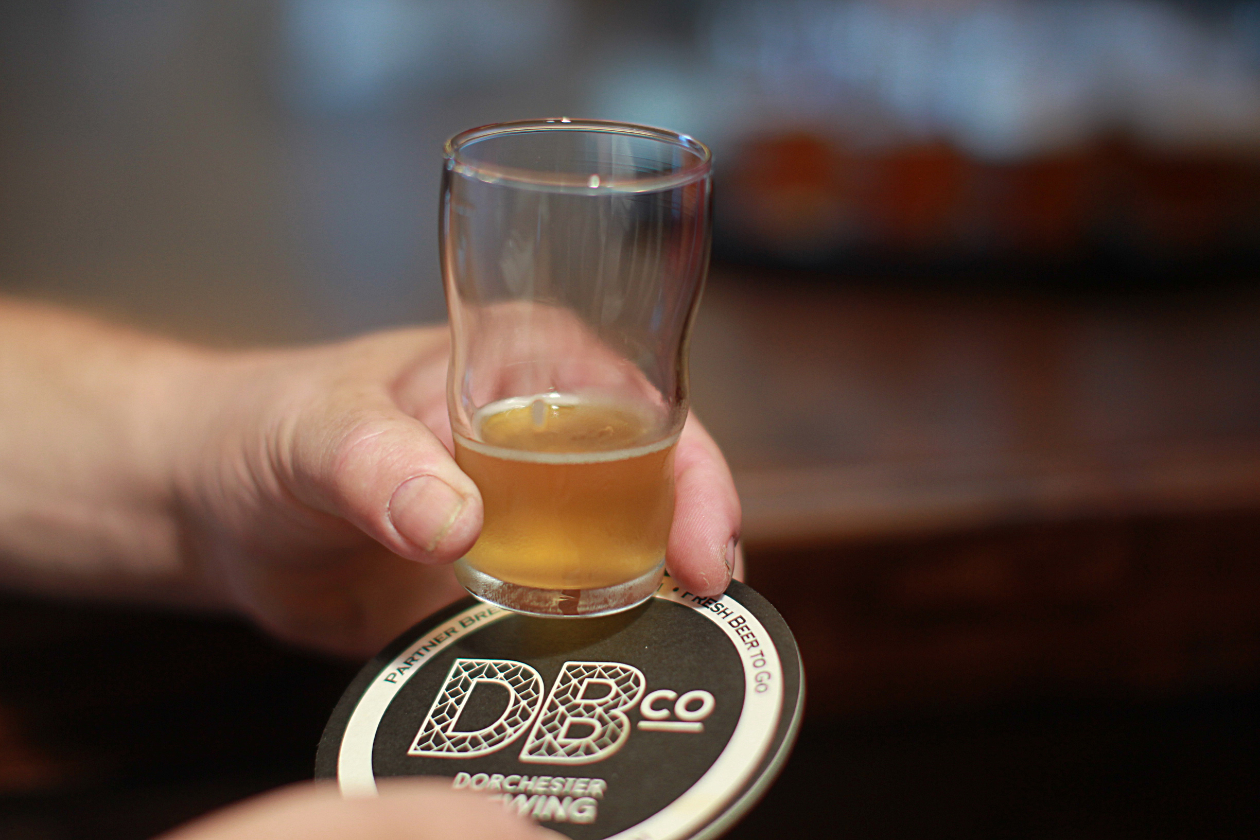 Six in-house drafts are currently on tap, most of which give a nod to the neighborhood, from a Savin Summer Stout to Mass Ave IPA.