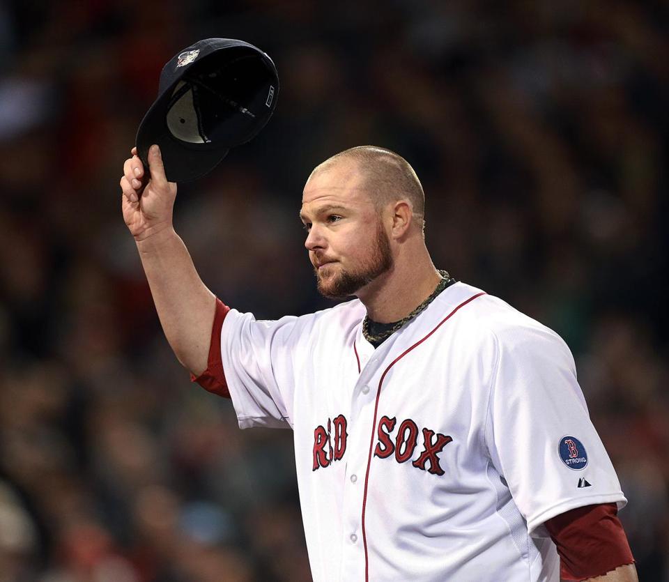 Lester acknowledged the Fenway Park crowd after being pulled in Game 1 of the 2013 World Series.