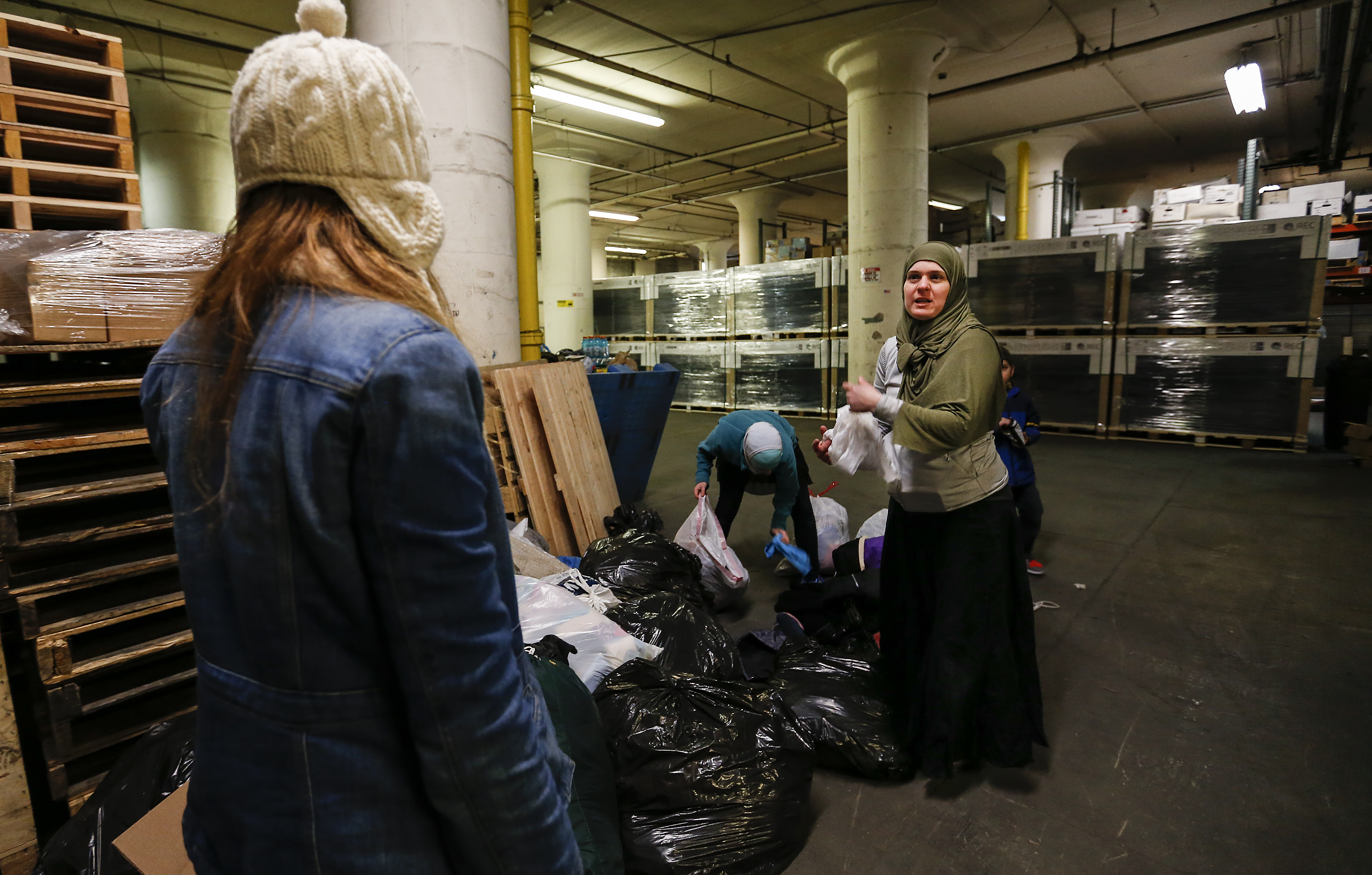 Nadia Alawa (right) has overseen the delivery of 53 containers of supplies to combat zones.