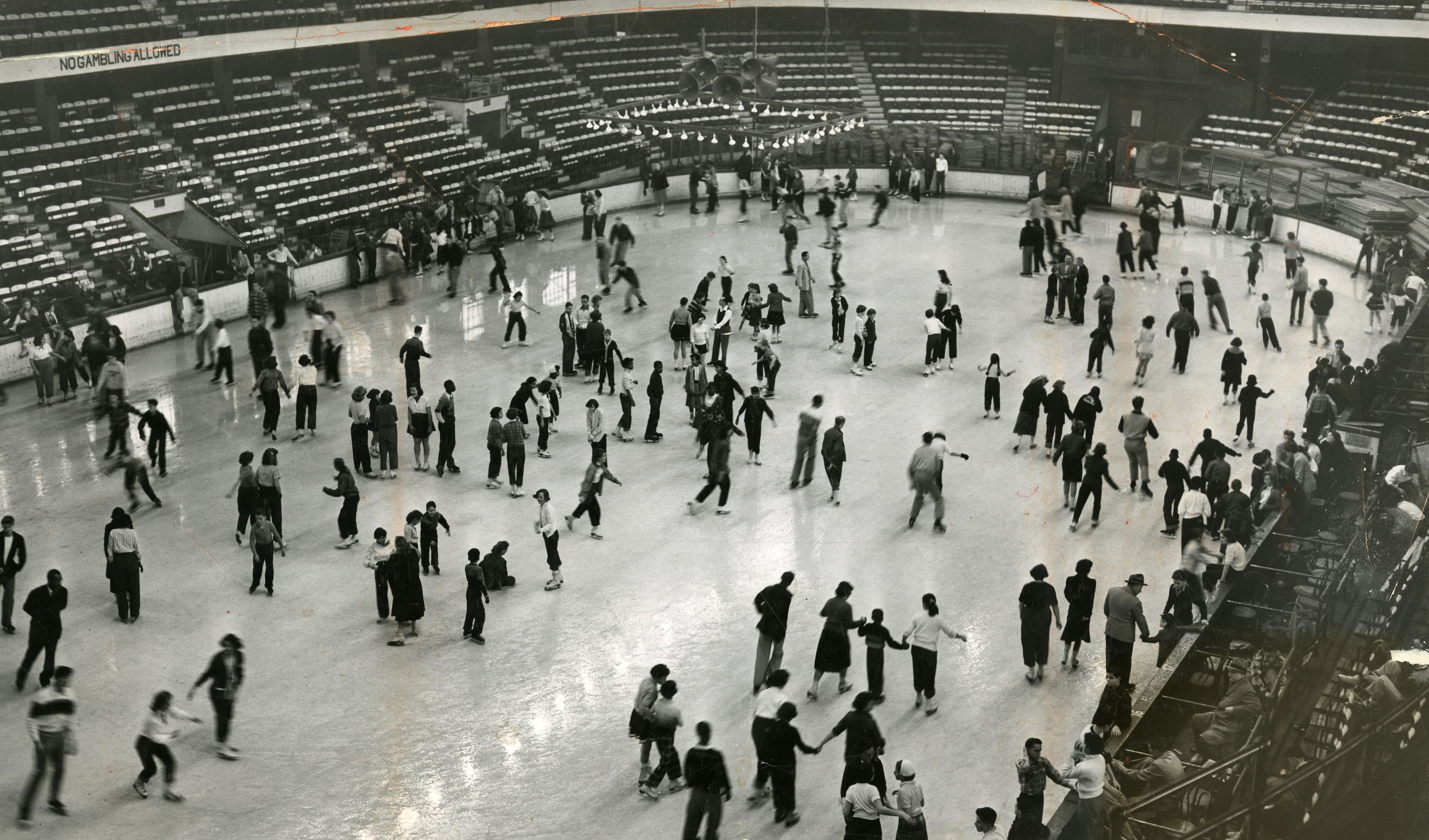 The Bruins and NU Huskies aren’t the only local skaters to take the ice at Matthews Arena. This photo from 1953 shows public skaters in a busy rink.