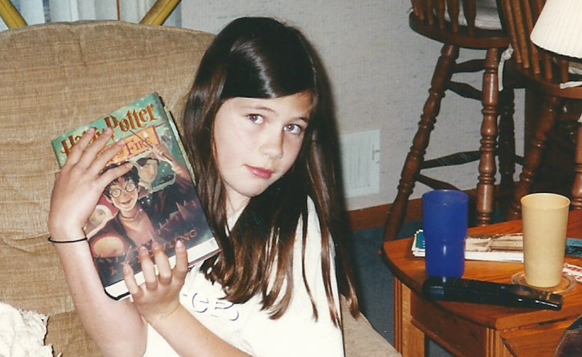 The author and a prized “Harry Potter” book many years ago.