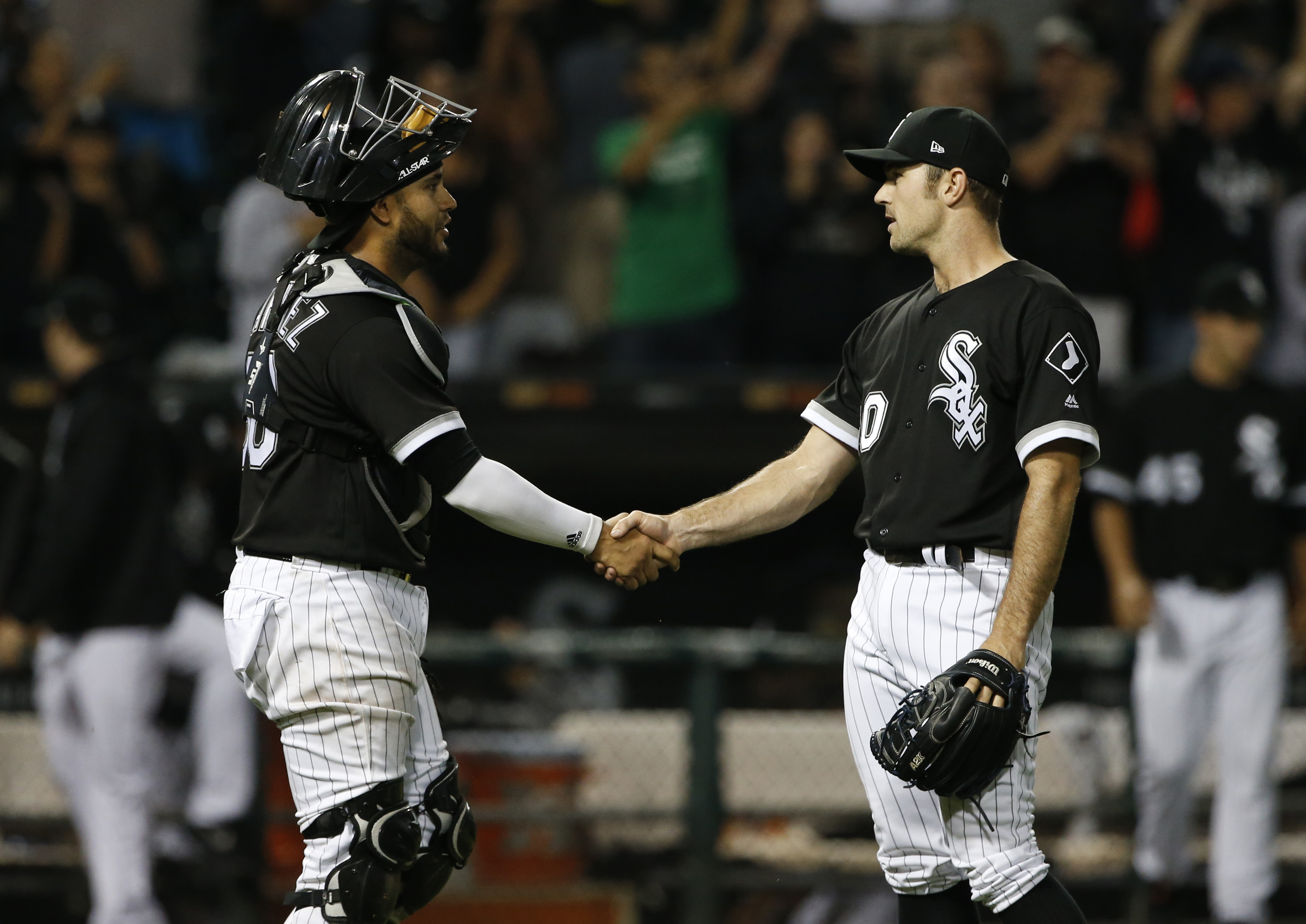 David Robertson (right) has 12 saves this season.