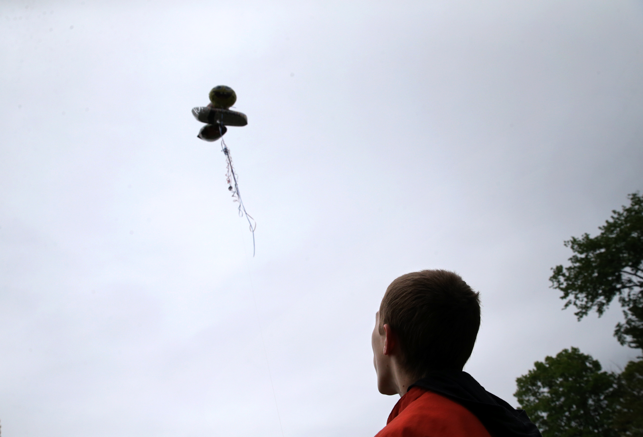 Connor flew balloons he attached to a kite string at his 13th birthday party. Connor has loved balloons since he was a baby. When one blew away outside his home in Wilmington, he started a dialogue with his alter ego, a sort of imaginary friend. “Once it’s gone it’s gone,” he said. “But I want it back. I want that balloon back. It’s gone, dude, it flew up to heaven.”
