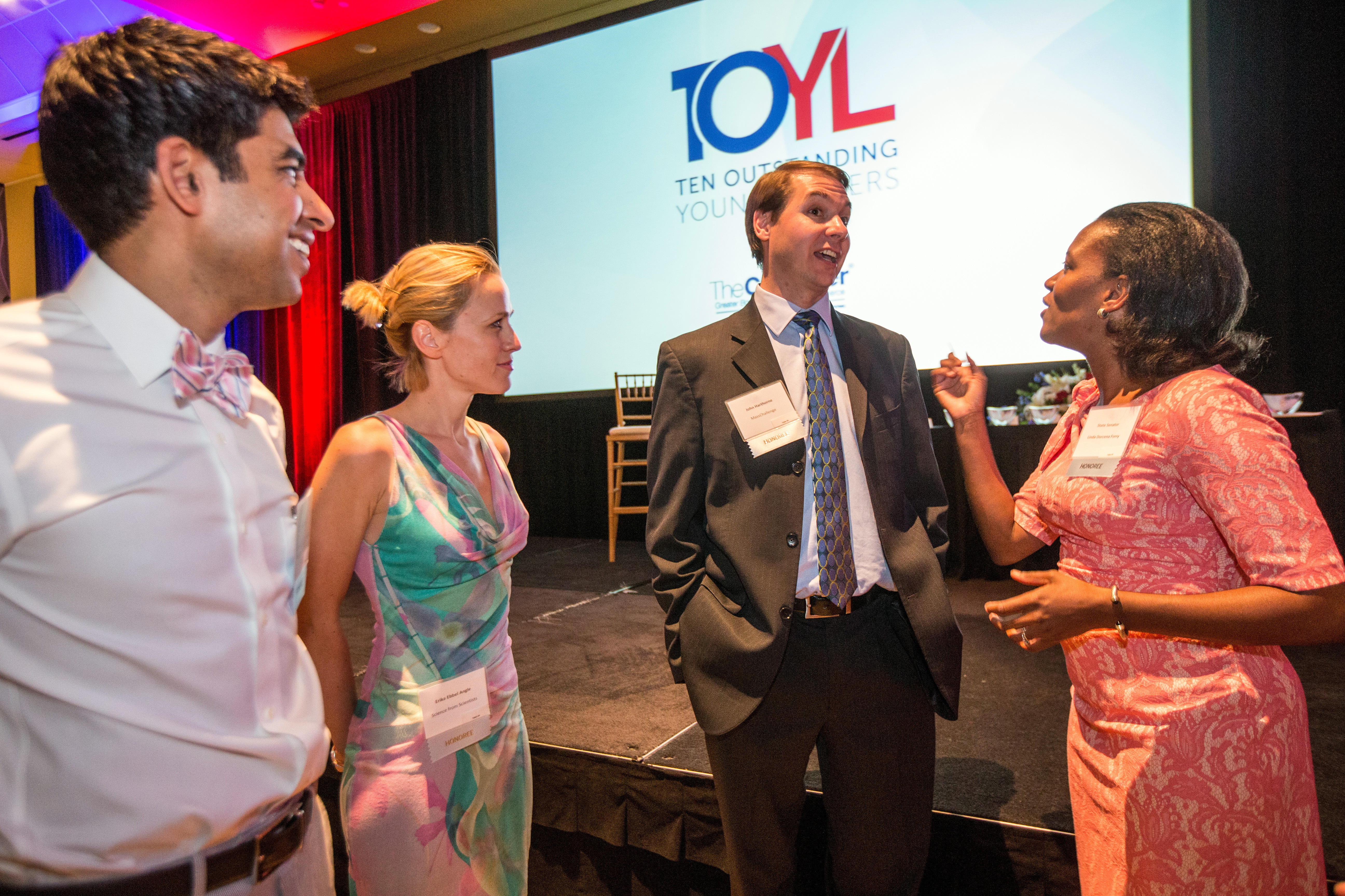 Honorees (from left) Neel Shah, Erika Ebbel Angle, John Harthorne, and state Senator Linda Dorcena Forry.