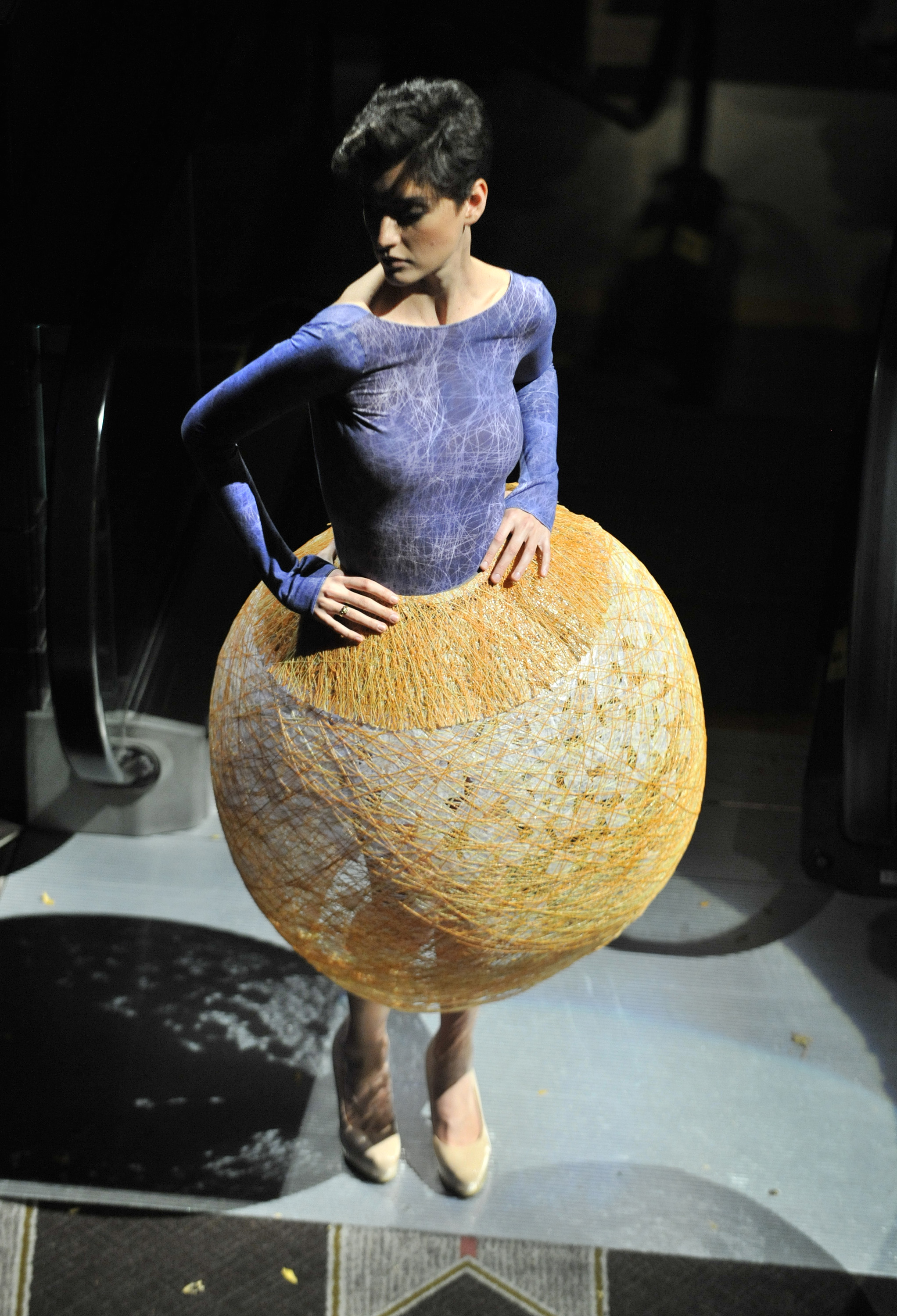 A model displays the entry from team Interwoven.