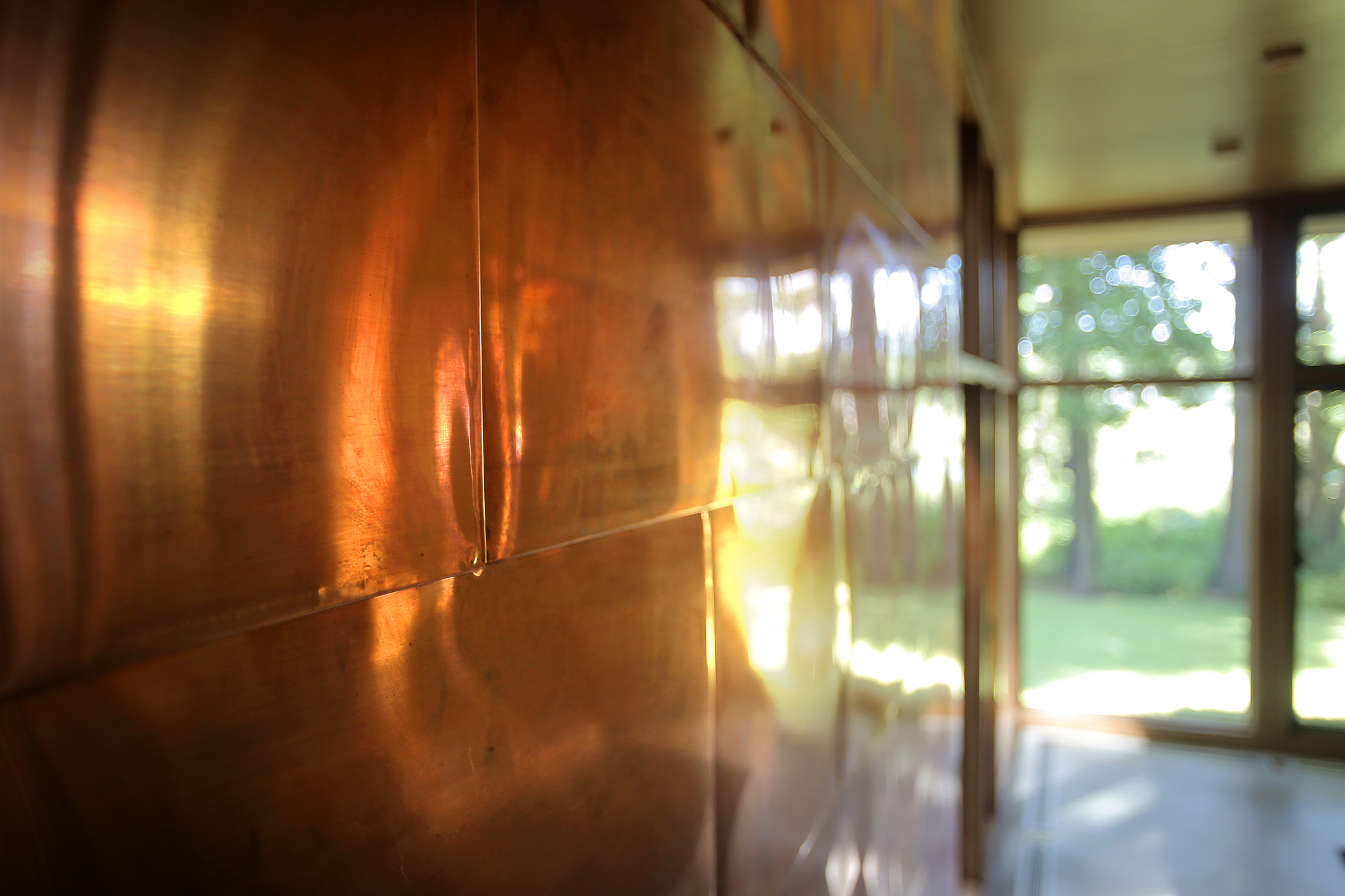 Some of the home’s walls are clad in copper.