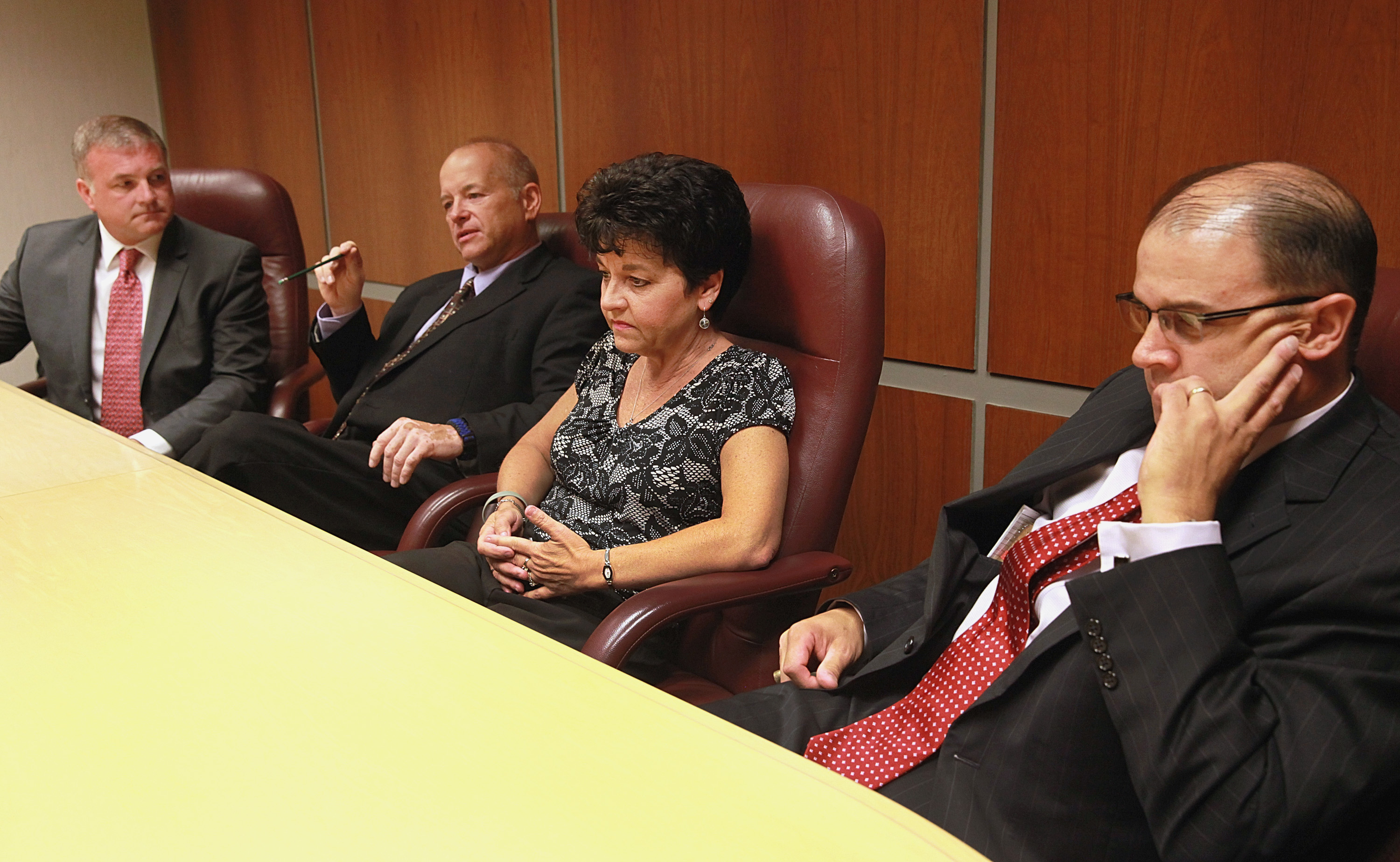 Market Basket executives (from left) Jim Lacourse, Steve Paulenka, Diane Belanger, and Tom Gordon discuss their planned protest at company headquarters in Tewksbury on July 15.
