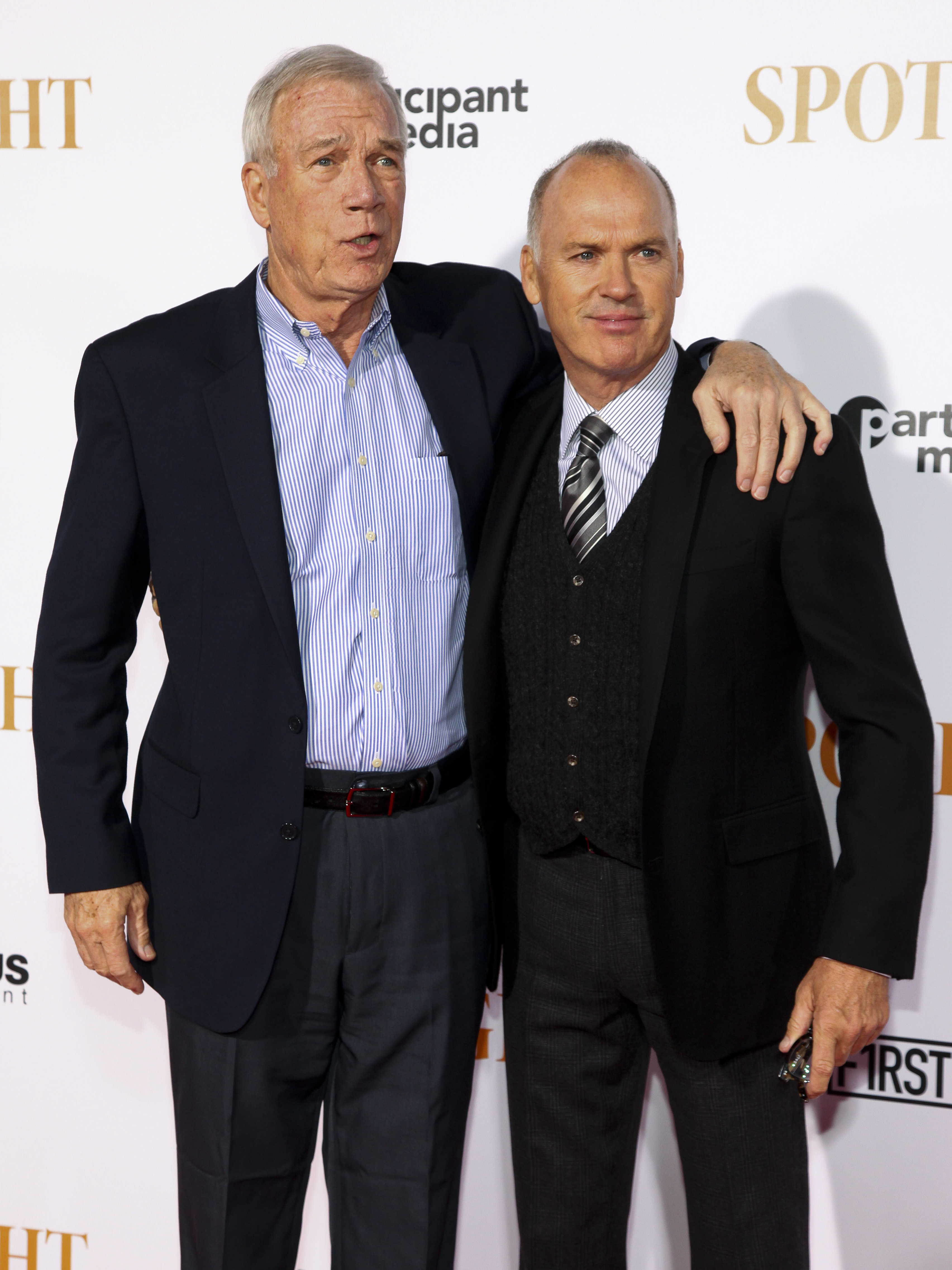 Walter Robinson (left) and Michael Keaton, attend the premiere of "Spotlight" in New York.
