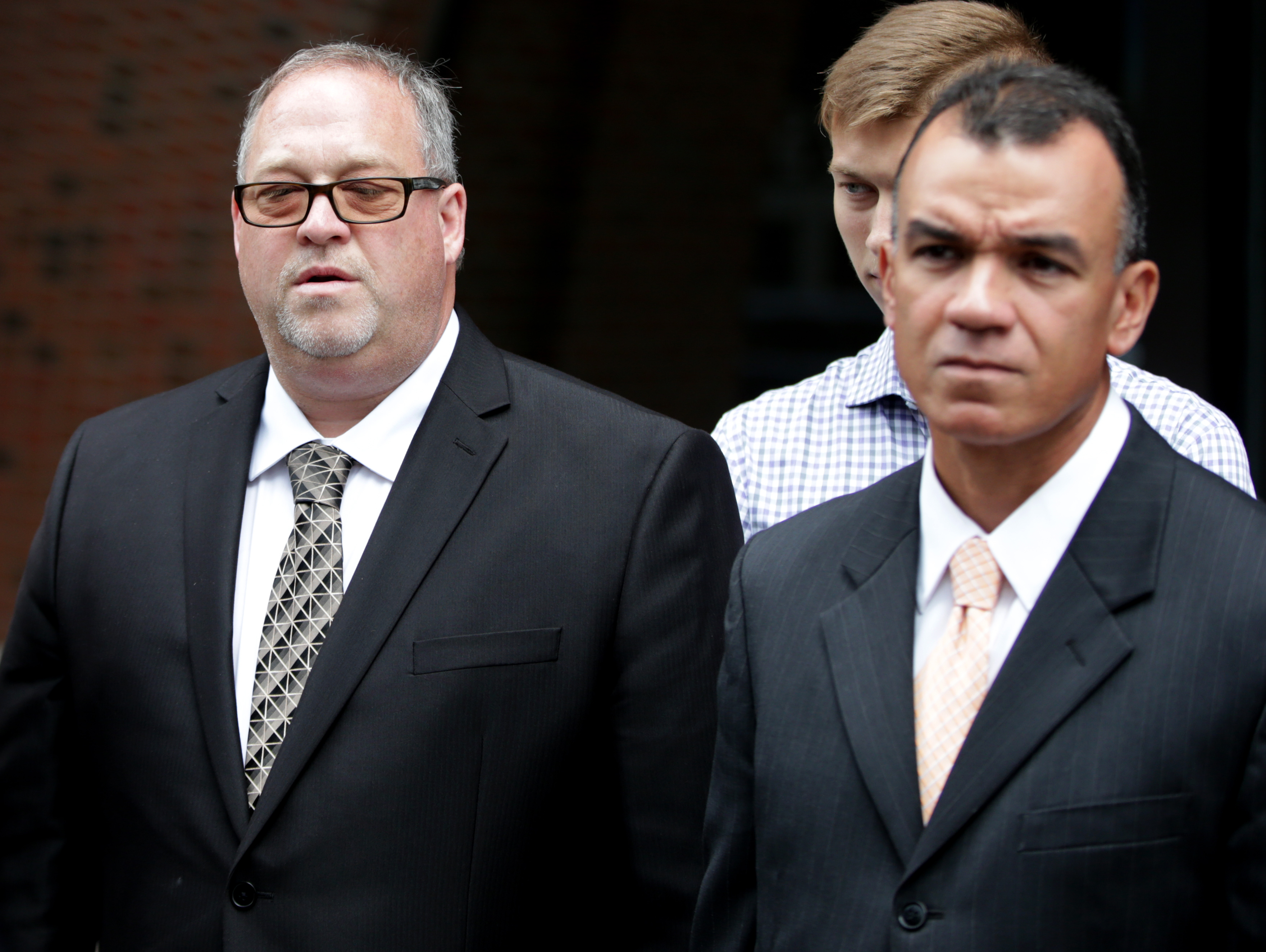 Defendant Daniel Redmond (left).