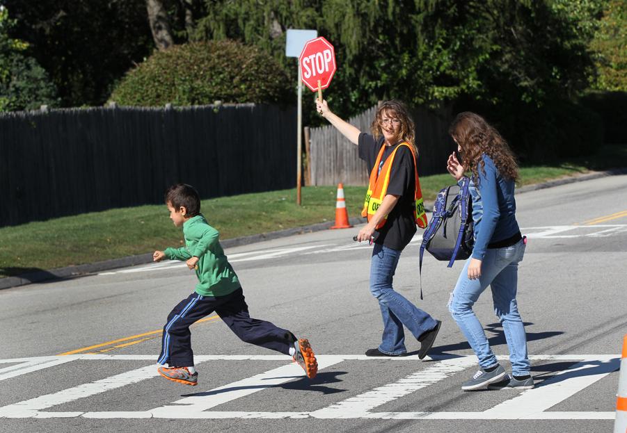 Crossing guard outside of Flagg Street School.