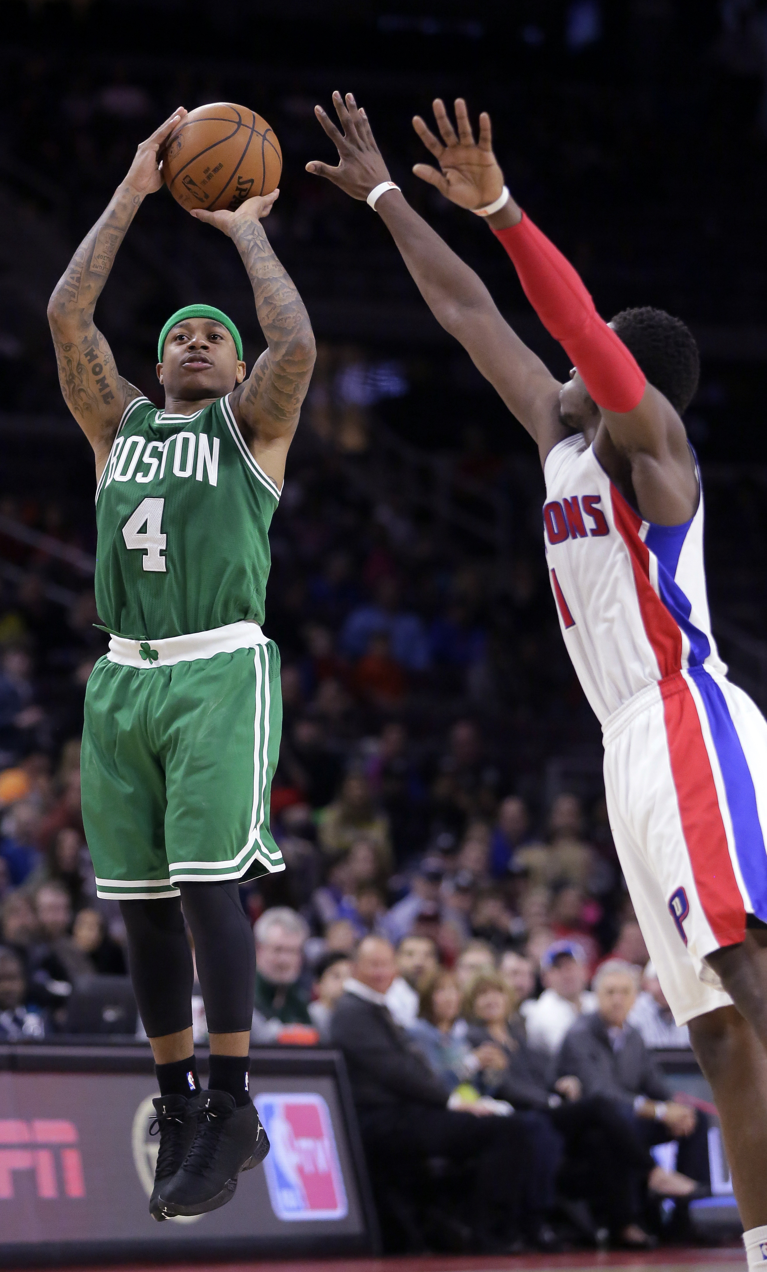 Isaiah Thomas took a three-point shot against the Pistons’ Reggie Jackson.