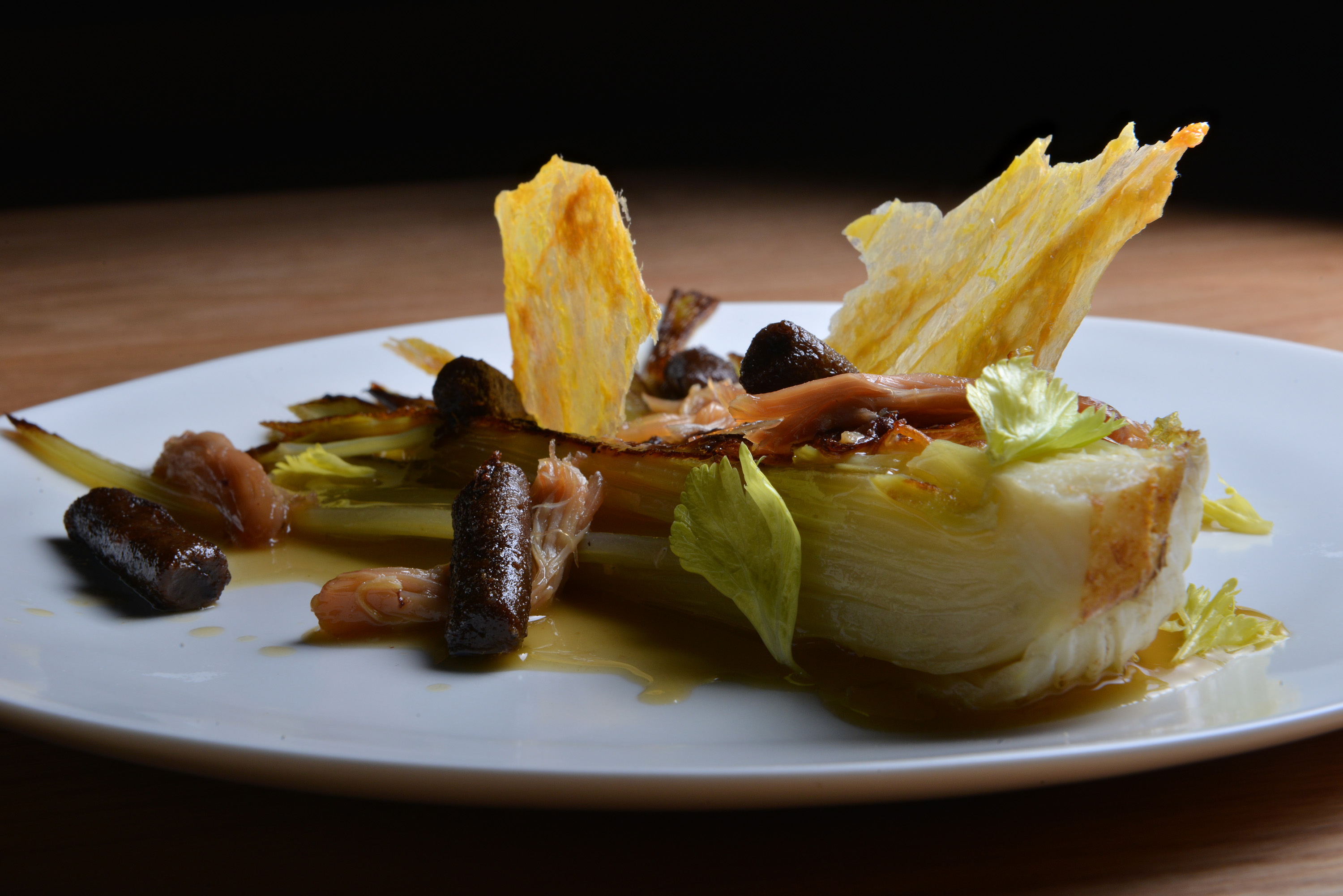 Braised selery with black garlic gnocci and chicken skin as served at Asta on Mass. Ave. in Boston. JOSH REYNOLDS FOR THE BOSTON GLOBE (Living/Arts, johnston) 25dining