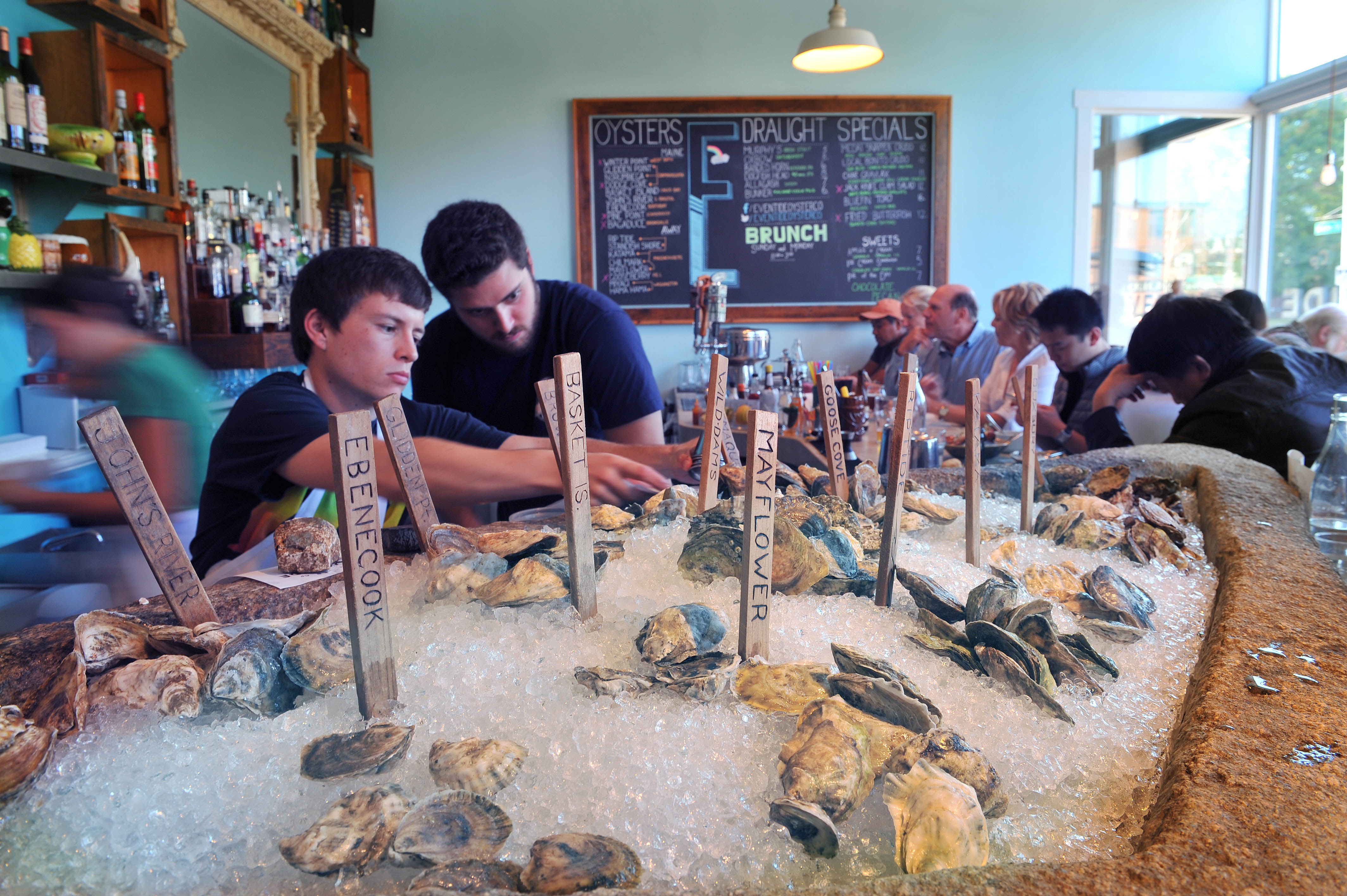 Staff IDs the goods at Eventide Oyster Co.