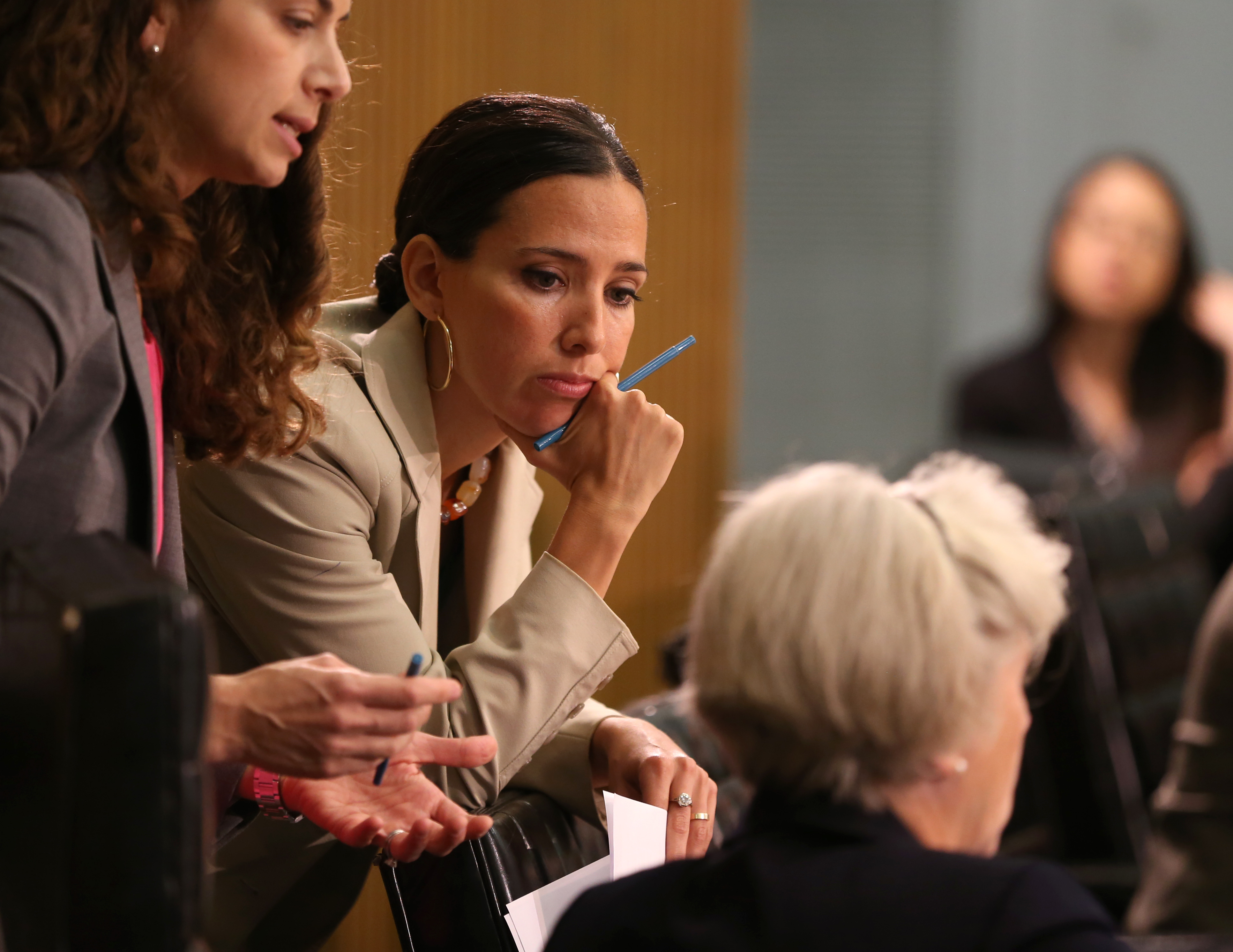 State Senator Sonia Chang-Diaz (center) said she wished her neighbor “had expressed his reservations to us when we solicited his input and support, before we committed our life savings to this renovation.”