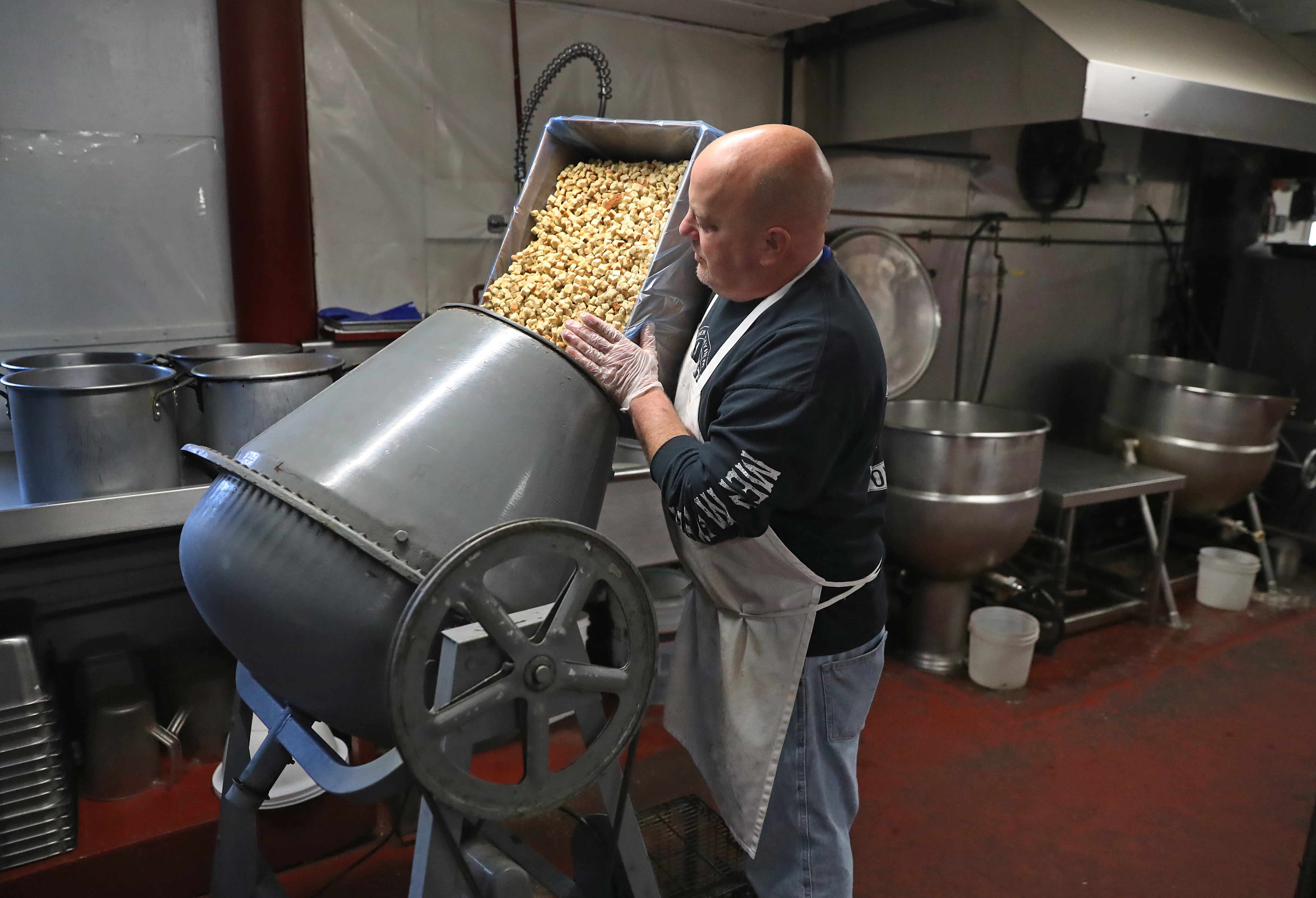 At Gerard Farm in Marshfield, owner Mark Gerard uses a cement mixer to make stuffing for Thanksgiving turkeys.