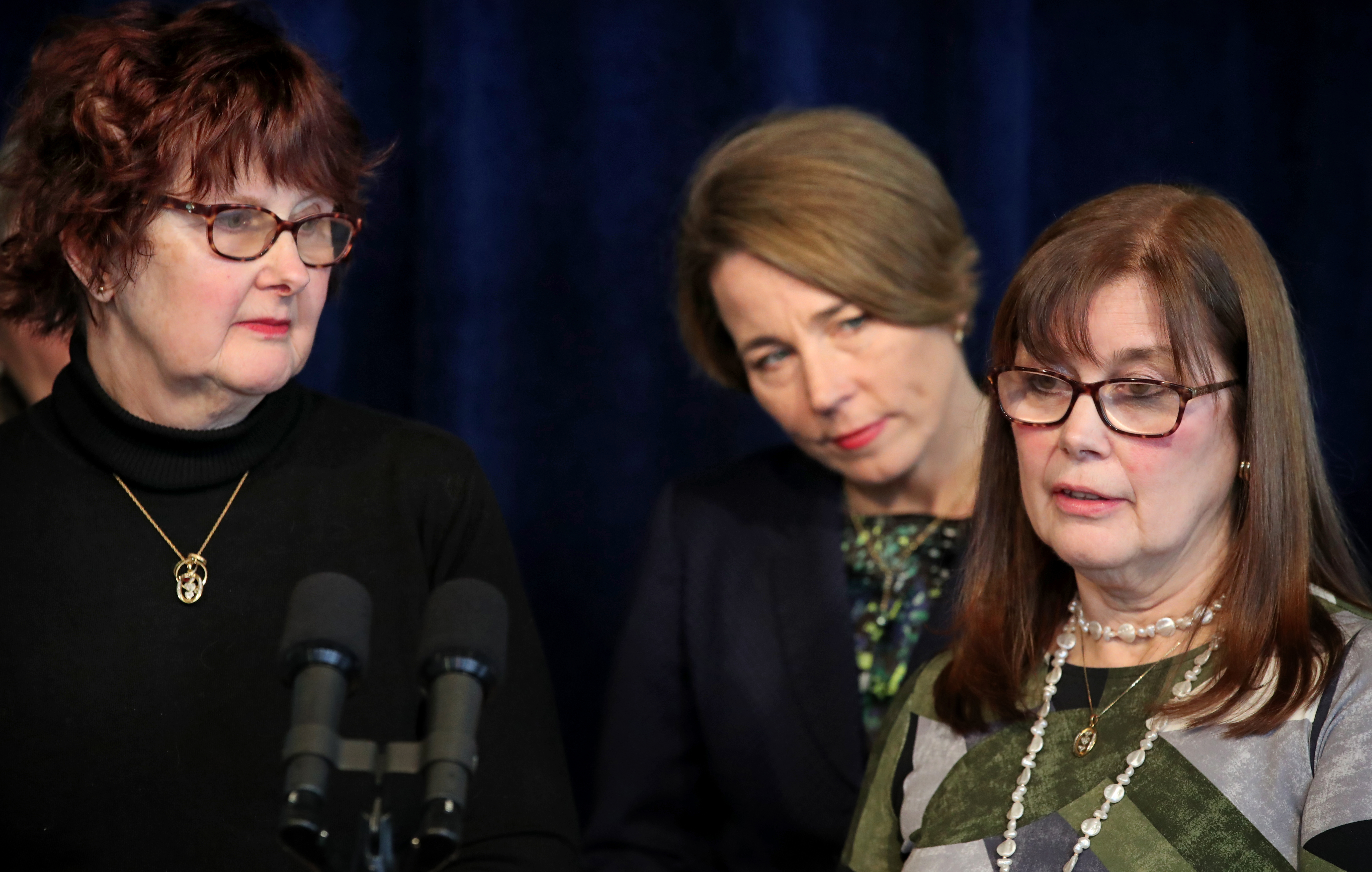 Maura Healey (center) was joined by Candi Hitchcock (left) and her sister Sammi Dawley during a press conference at the Massachusetts attorney general's office in Boston on Wednesday.