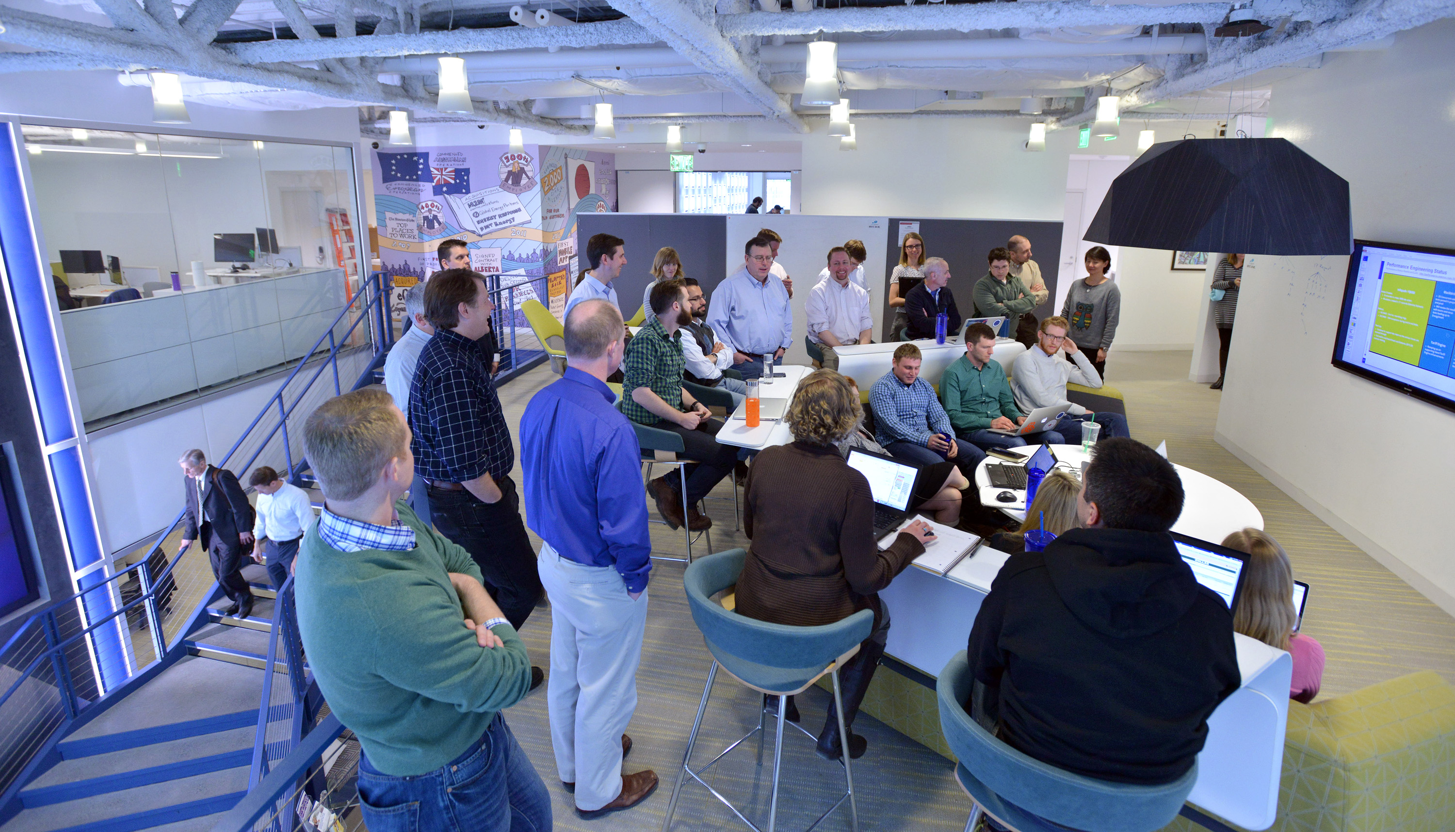 Employees attended a meeting held in the “media scape” area of EnerNoc’s headquarters.