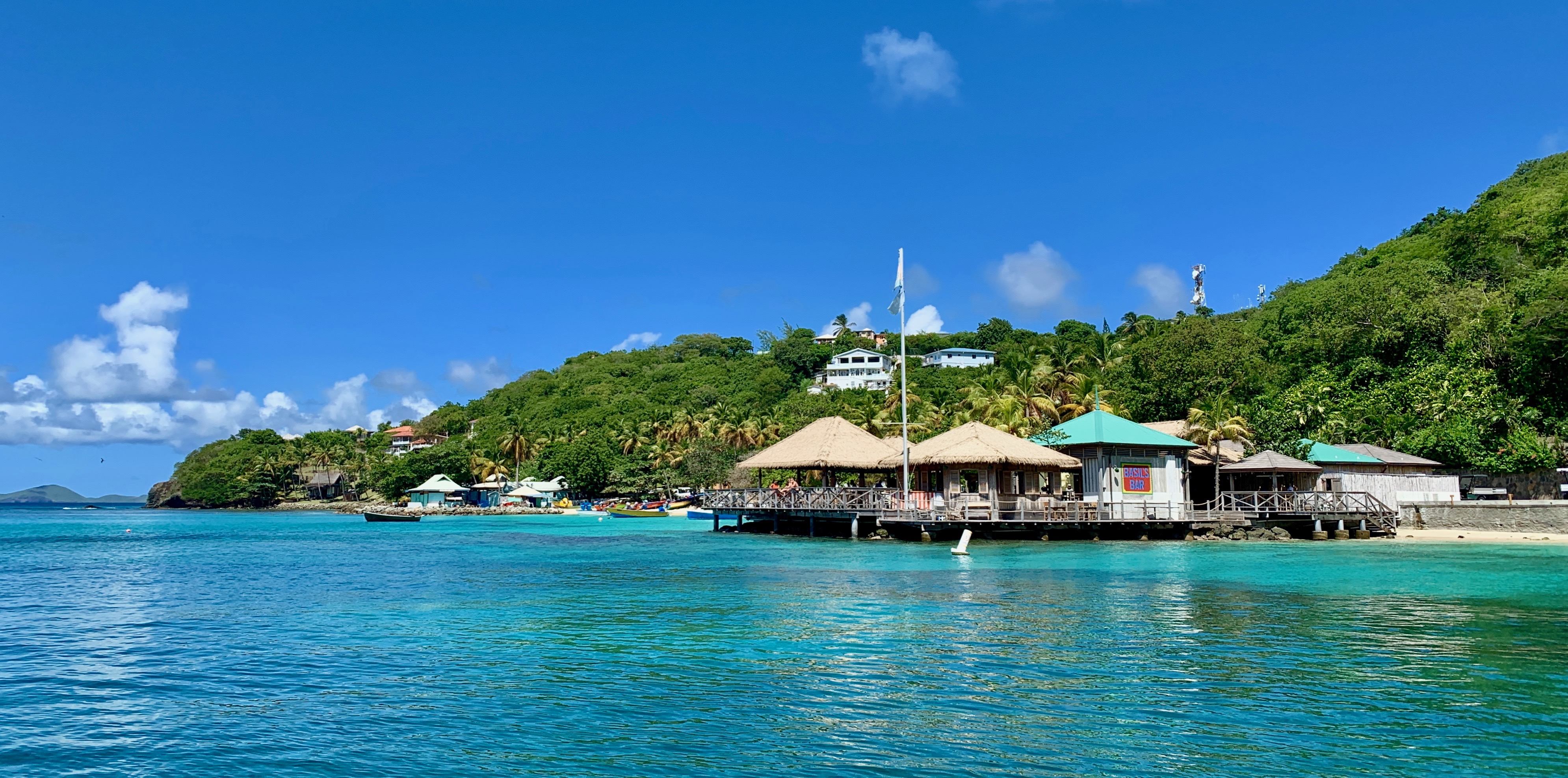 Basil's Bar in Mustique is perched over the water for optimal sunset views.