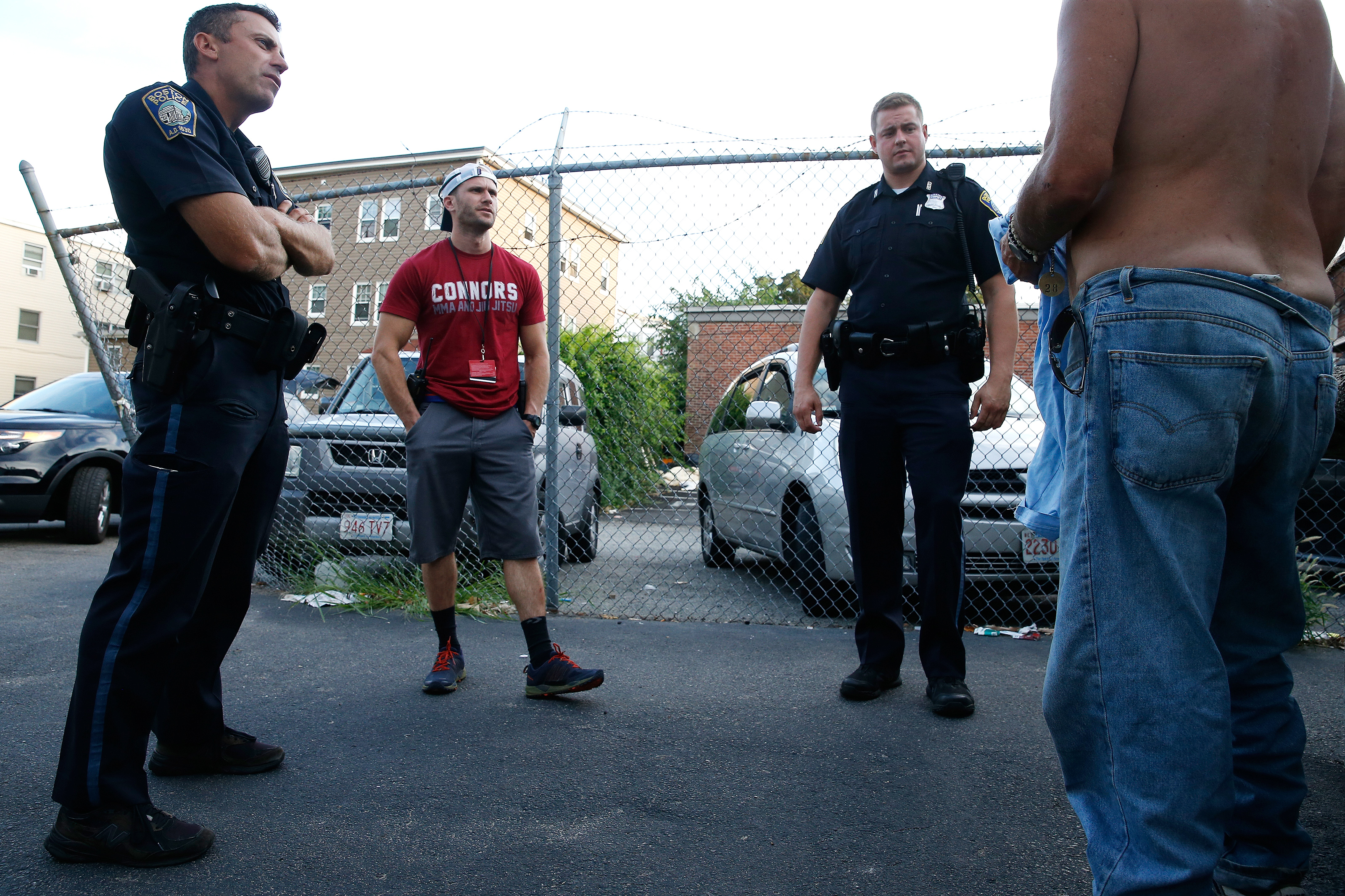 Driscoll, crisis clinician Ben Linsky, and Officer Michael Sullivan chatted with a man who they regularly check in on in Mattapan.
