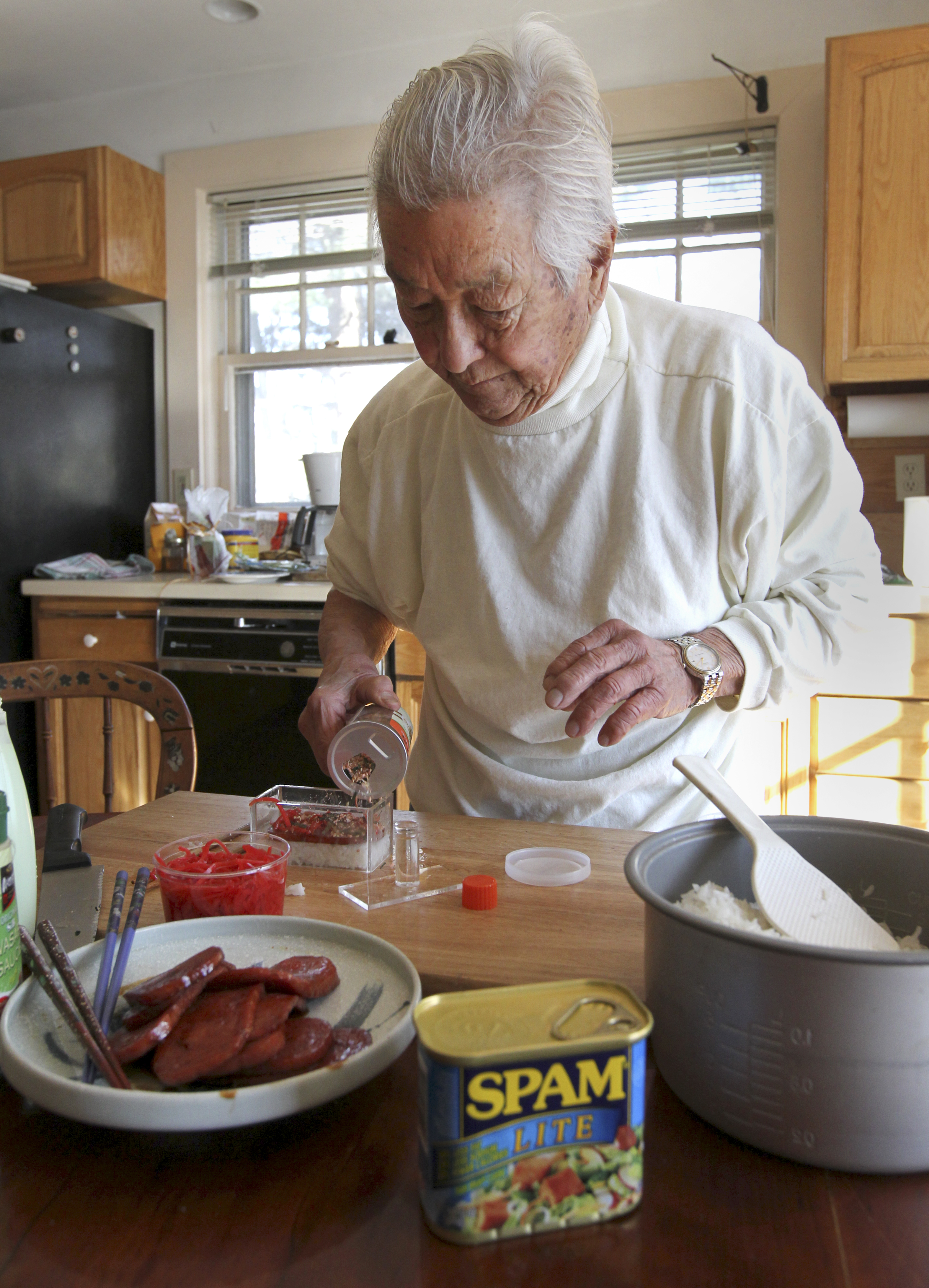 Ito in his home in Wellesley.