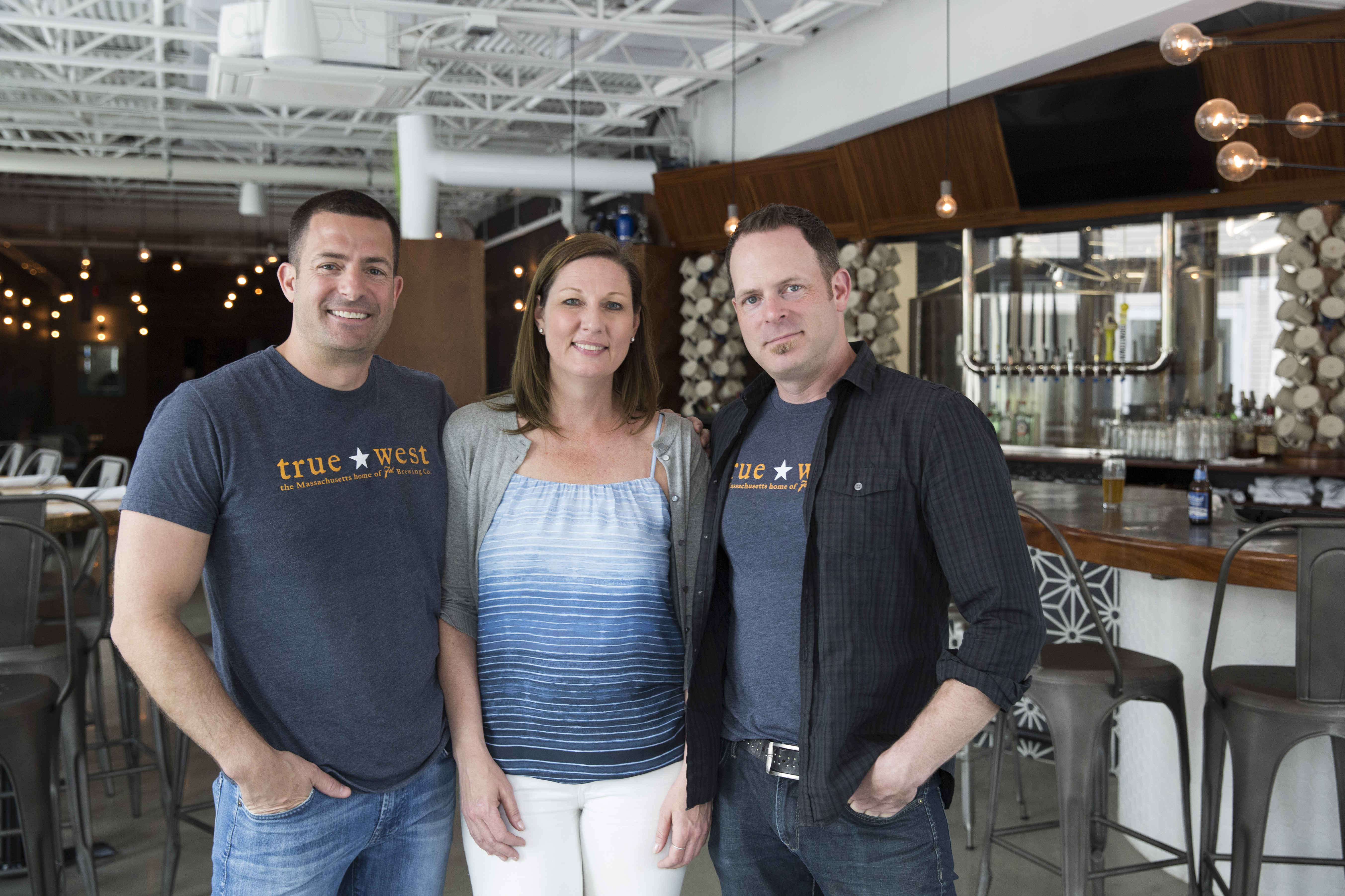 From left: Owners Matthew, Stephanie, and Peter Henry.