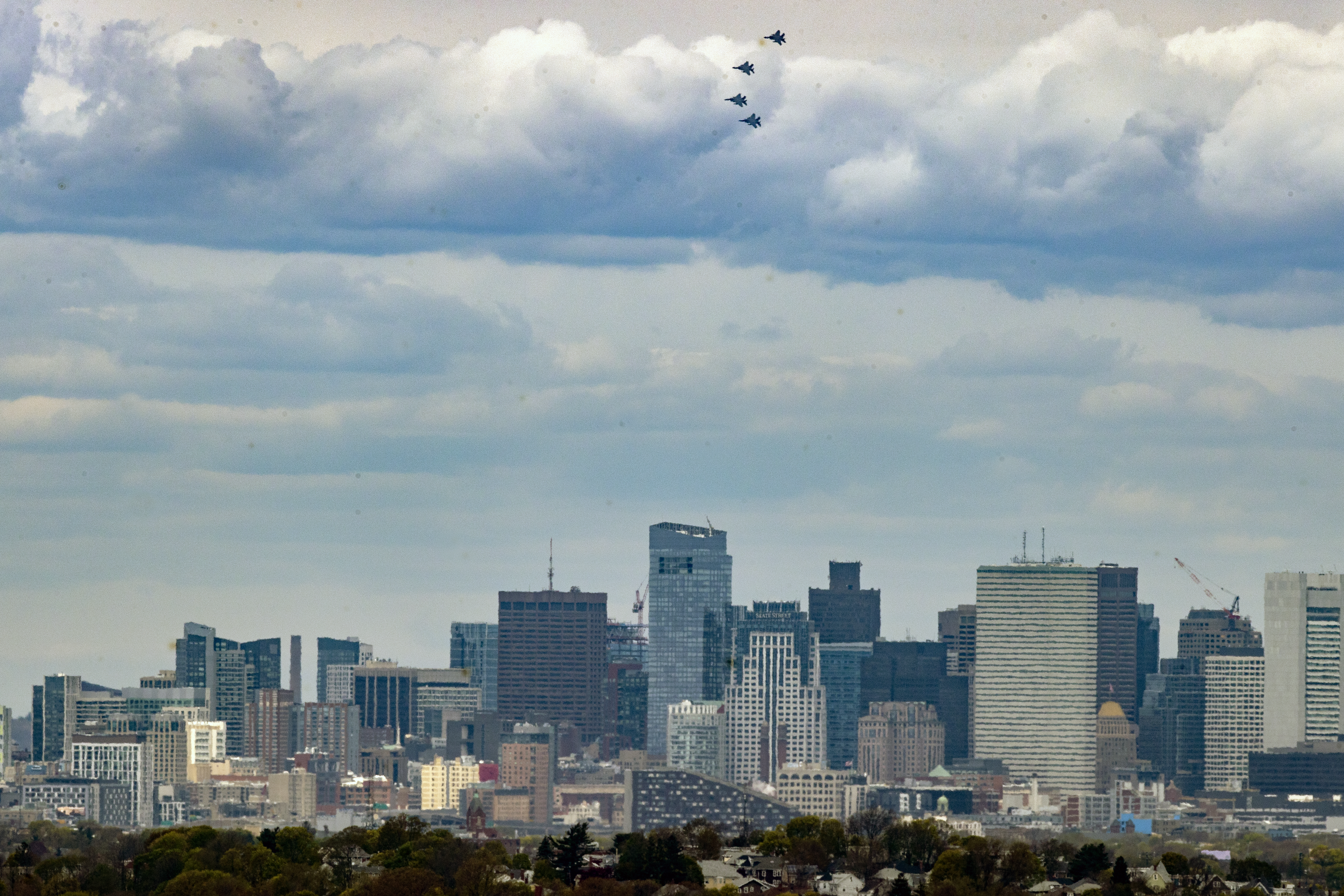 Jets from the Massachusetts Air National Guard 104th Fighter Wing flew over Boston.