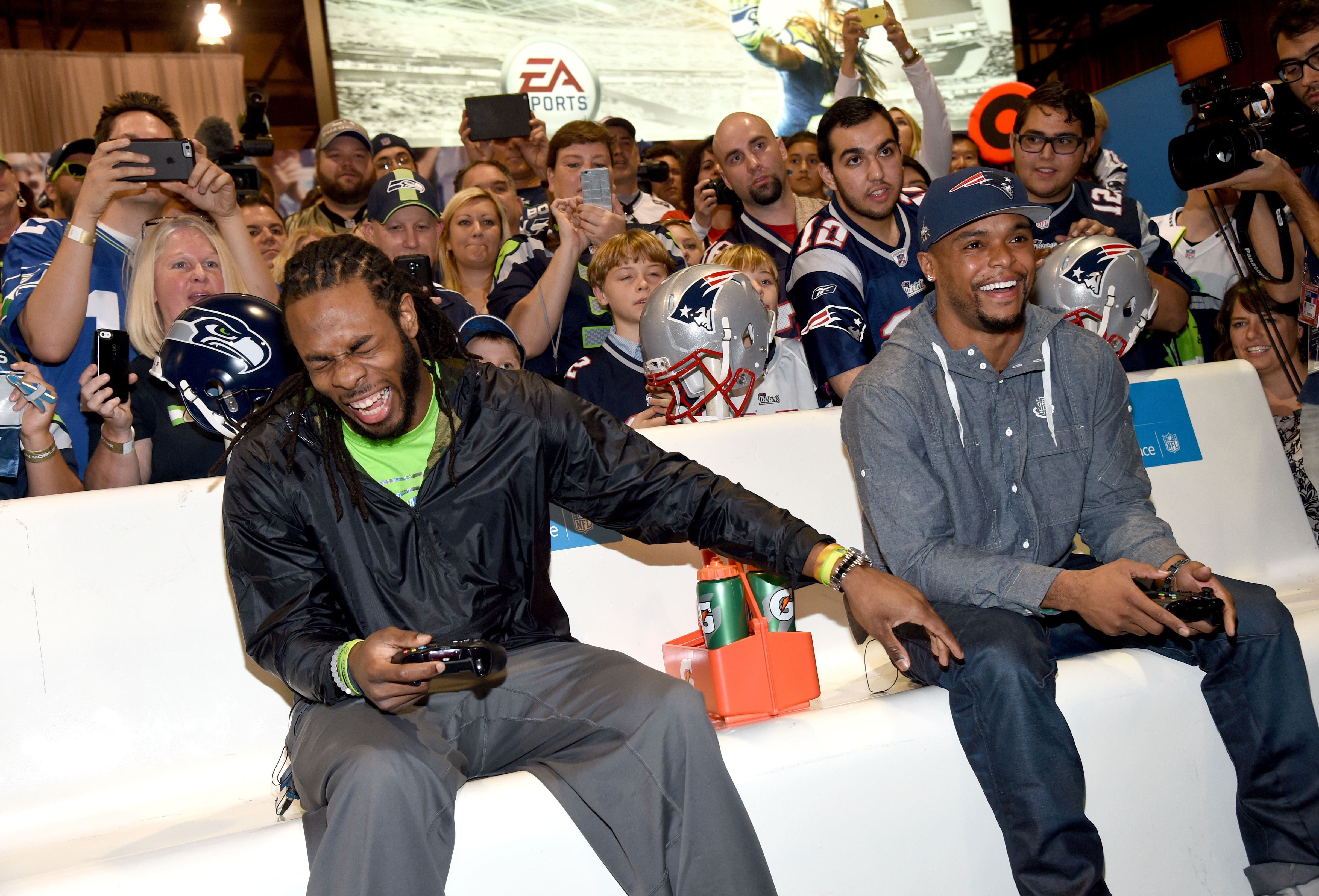 The Seahawks’ Richard Sherman and the Patriots’ Shane Vereen playing Xbox at the NFL Experience.