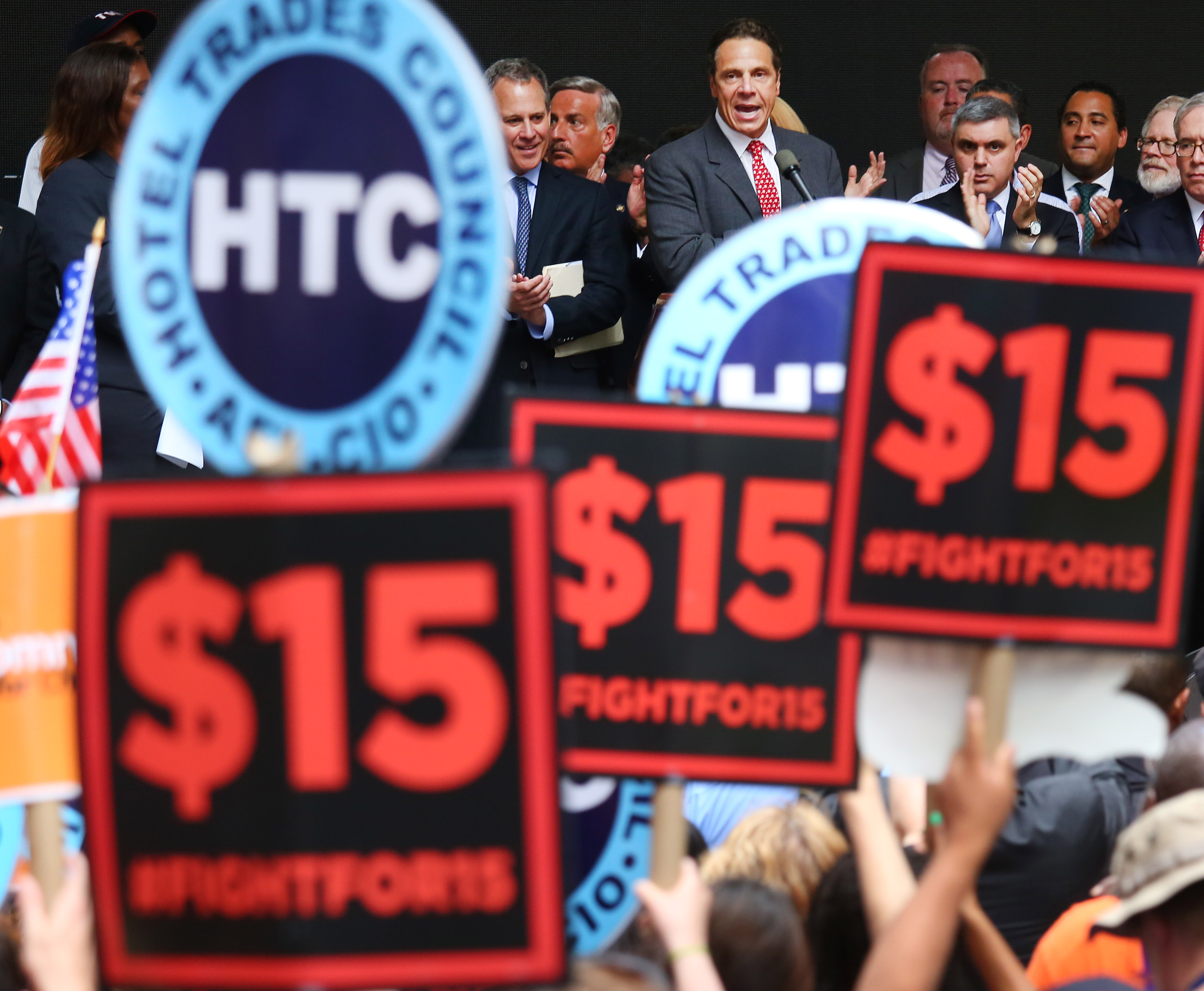 Governor Andrew Cuomo of New York attends a rally of activists calling for higher wages in the fast food industry in Manhattan in June.