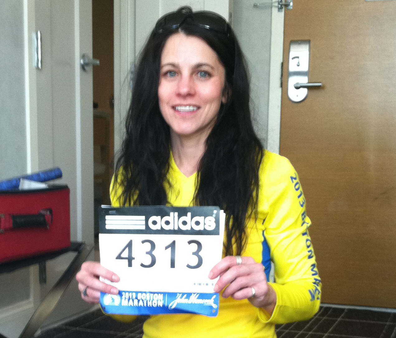 Stacy Shaw (shown before the race, in her hotel room) is grateful for the push spectators gave her.