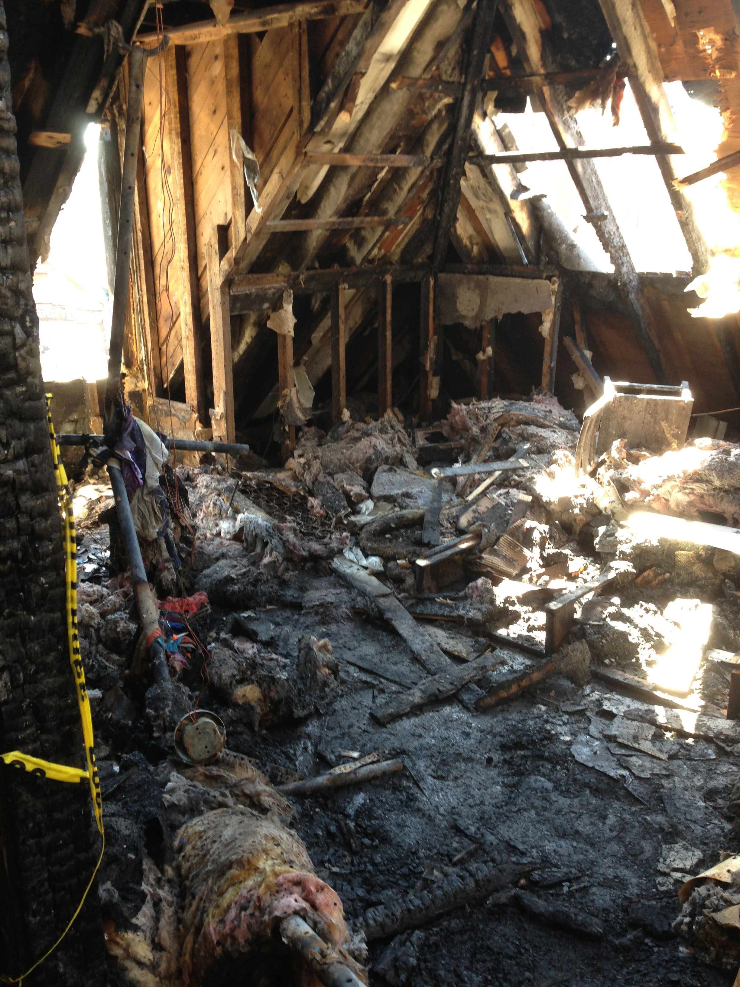 The blackened attic apartment where Binland died.