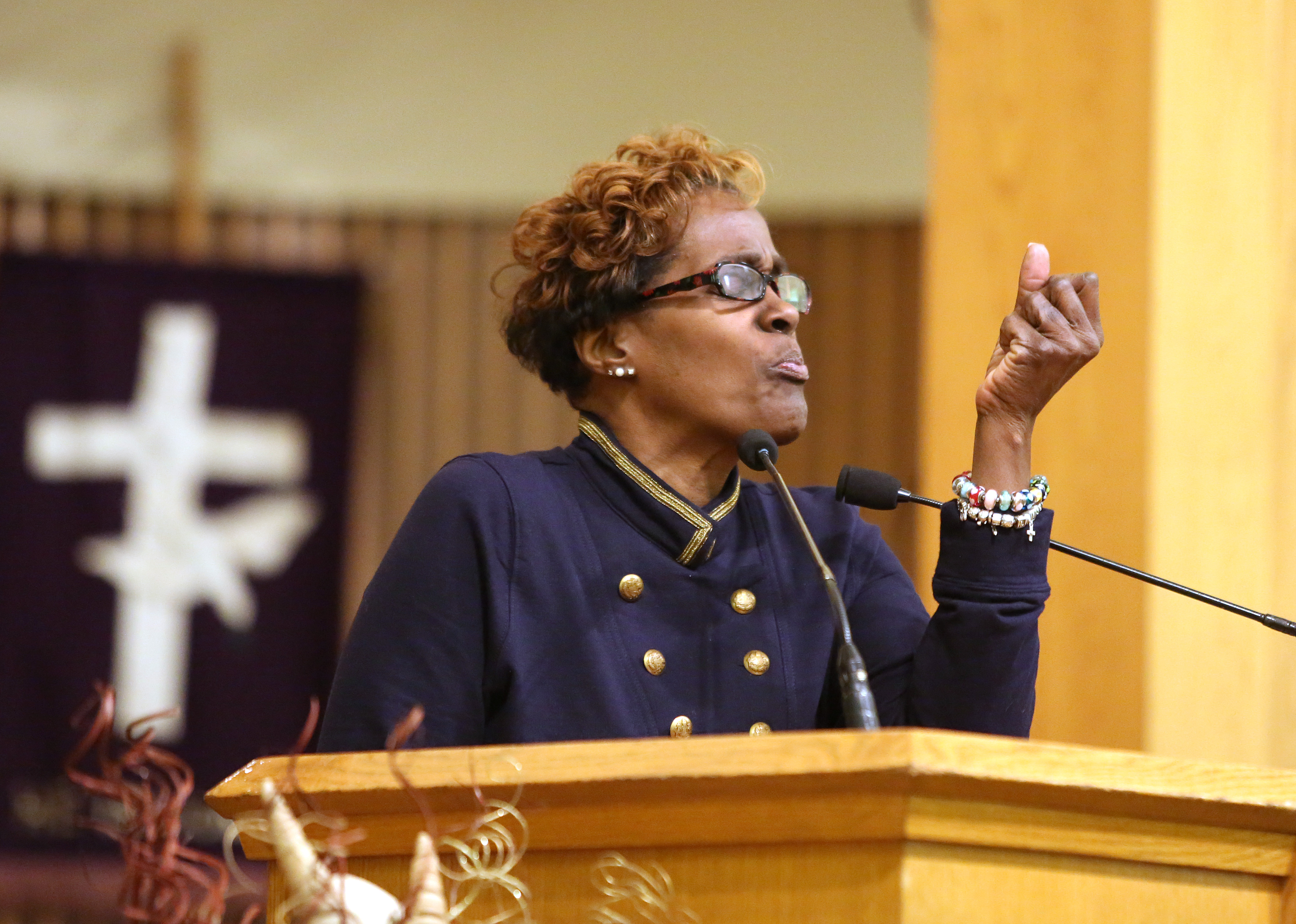 The Rev. Laura Ahart’s call to ministry takes her to many places, filling many needs. Here, she delivered a prayer of comfort during a funeral service at Twelfth Baptist Church on Tuesday. She is the pastor of United Baptist Church in Jamaica Plain.