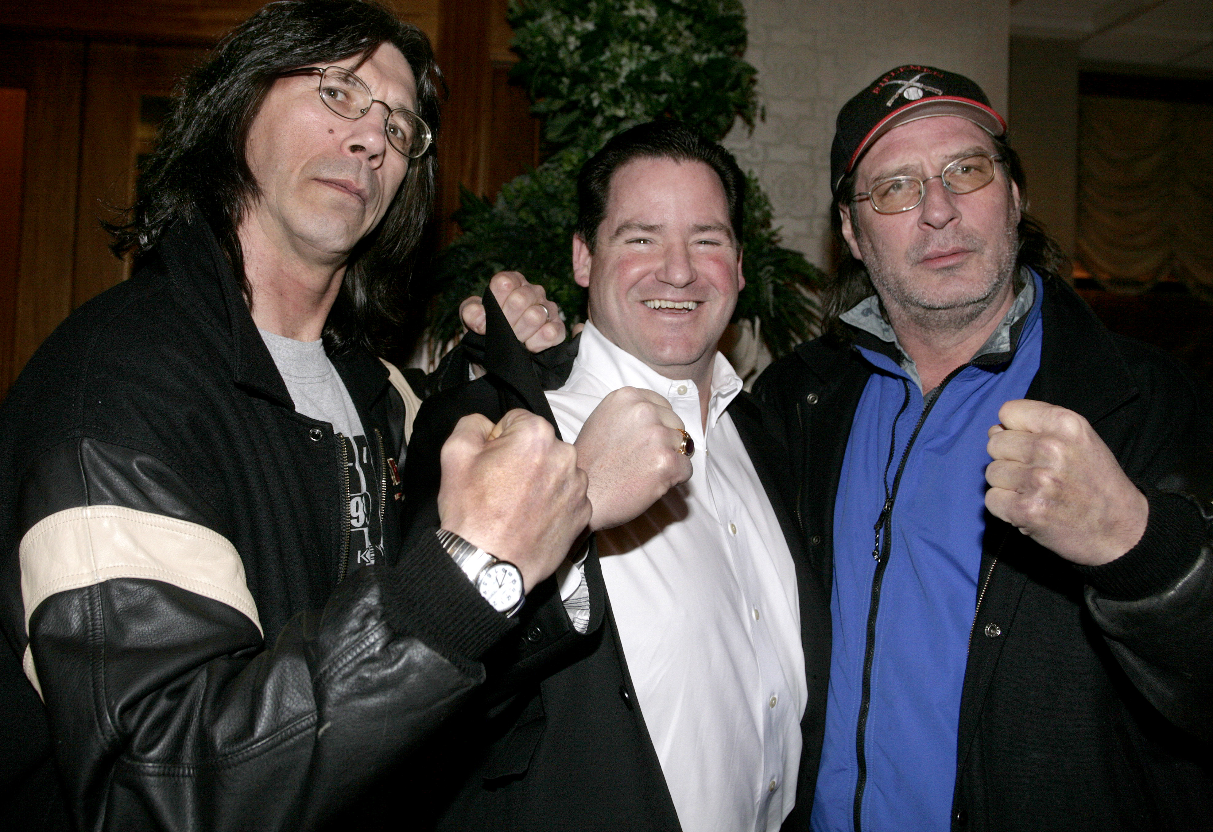 Dan Flynn (center) posed with former hockey players Steve Carlson (left) and Jeff Carlson (right) at the Boston Black and Gold Legends reception and auction benefit in Dorchester in 2007. The Carlson brothers played the two-thirds of the Hanson Brothers in the 1977 film ‘Slap Shot.’