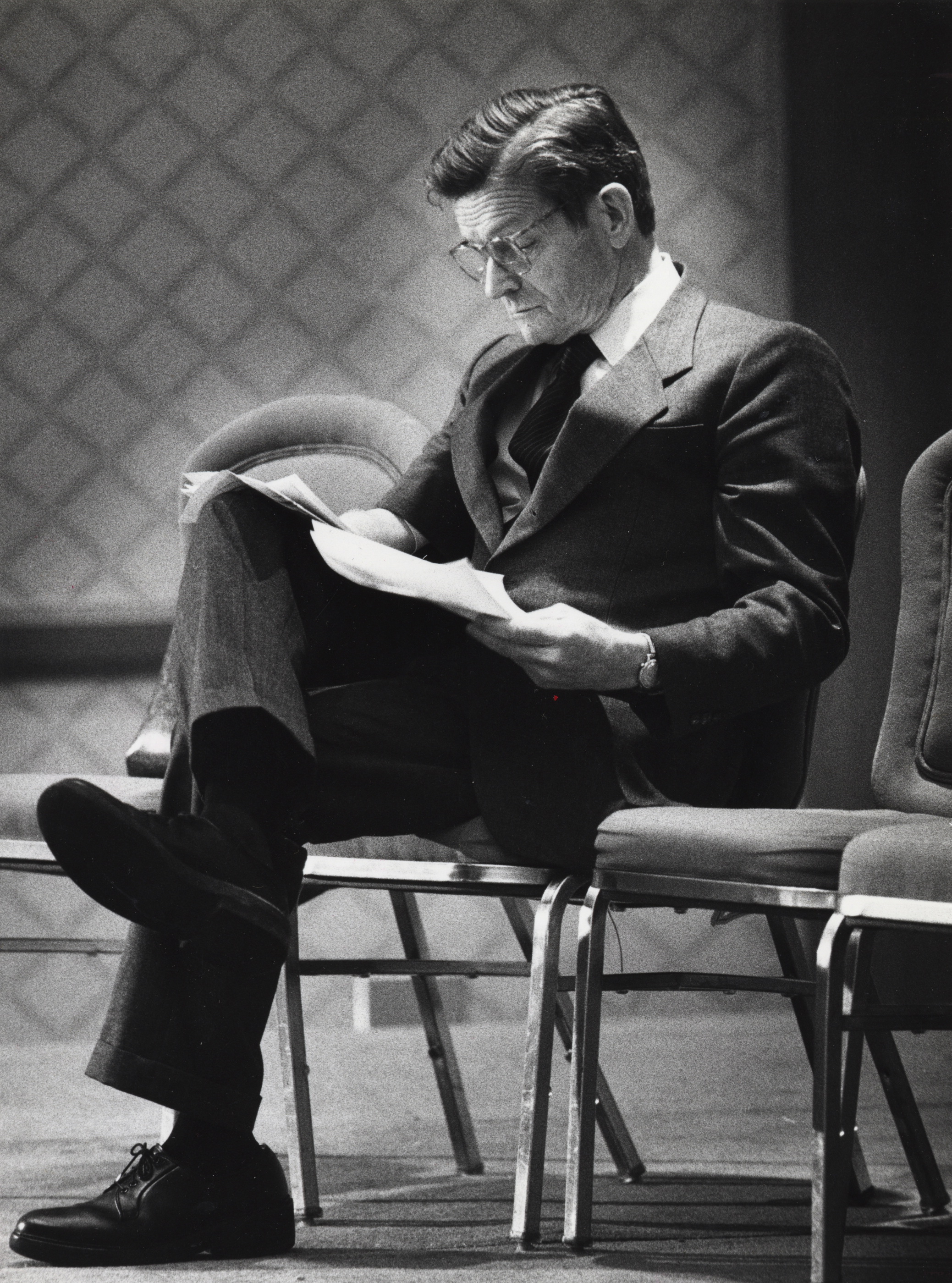 John Silber checked his notes before speaking at the Sheraton Boston Hotel in October, 1990.