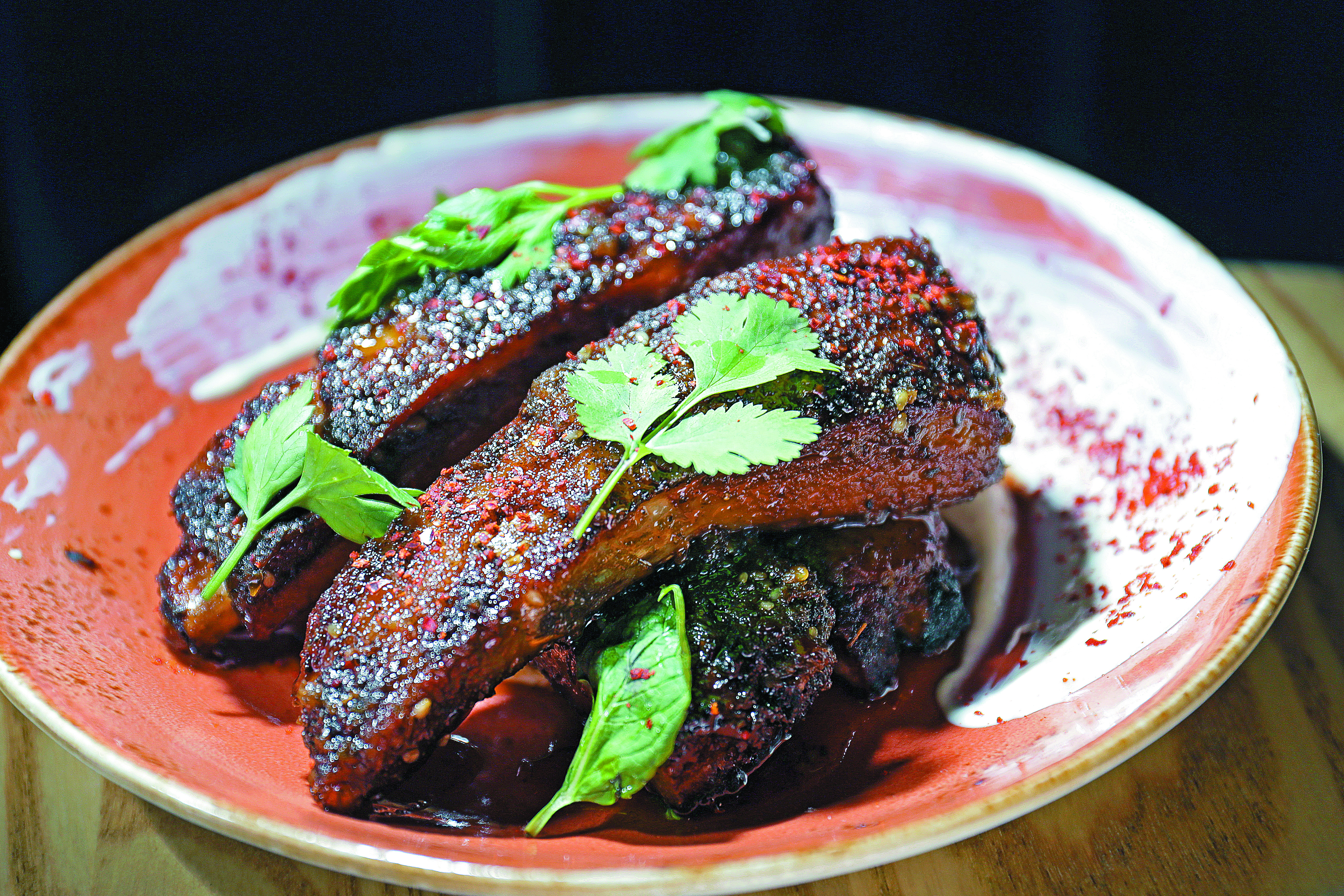 Crispy pork ribs with honey za’atar glaze and labneh at Buttonwood.