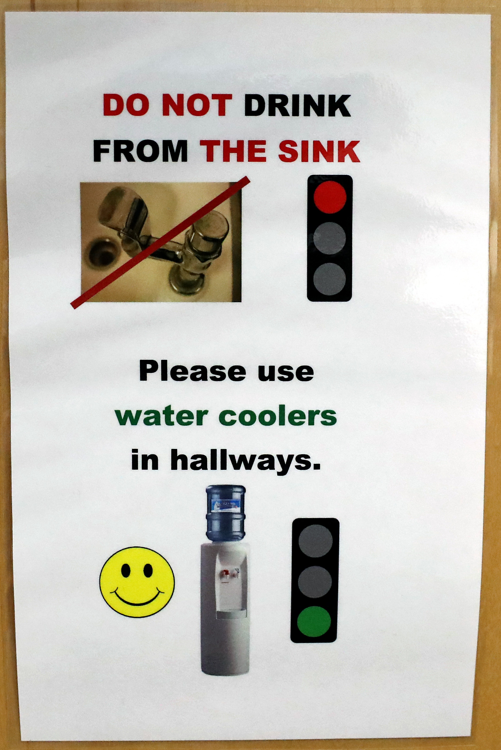 Signs posted throughout The Center School in Stow warn students not to drink the water.